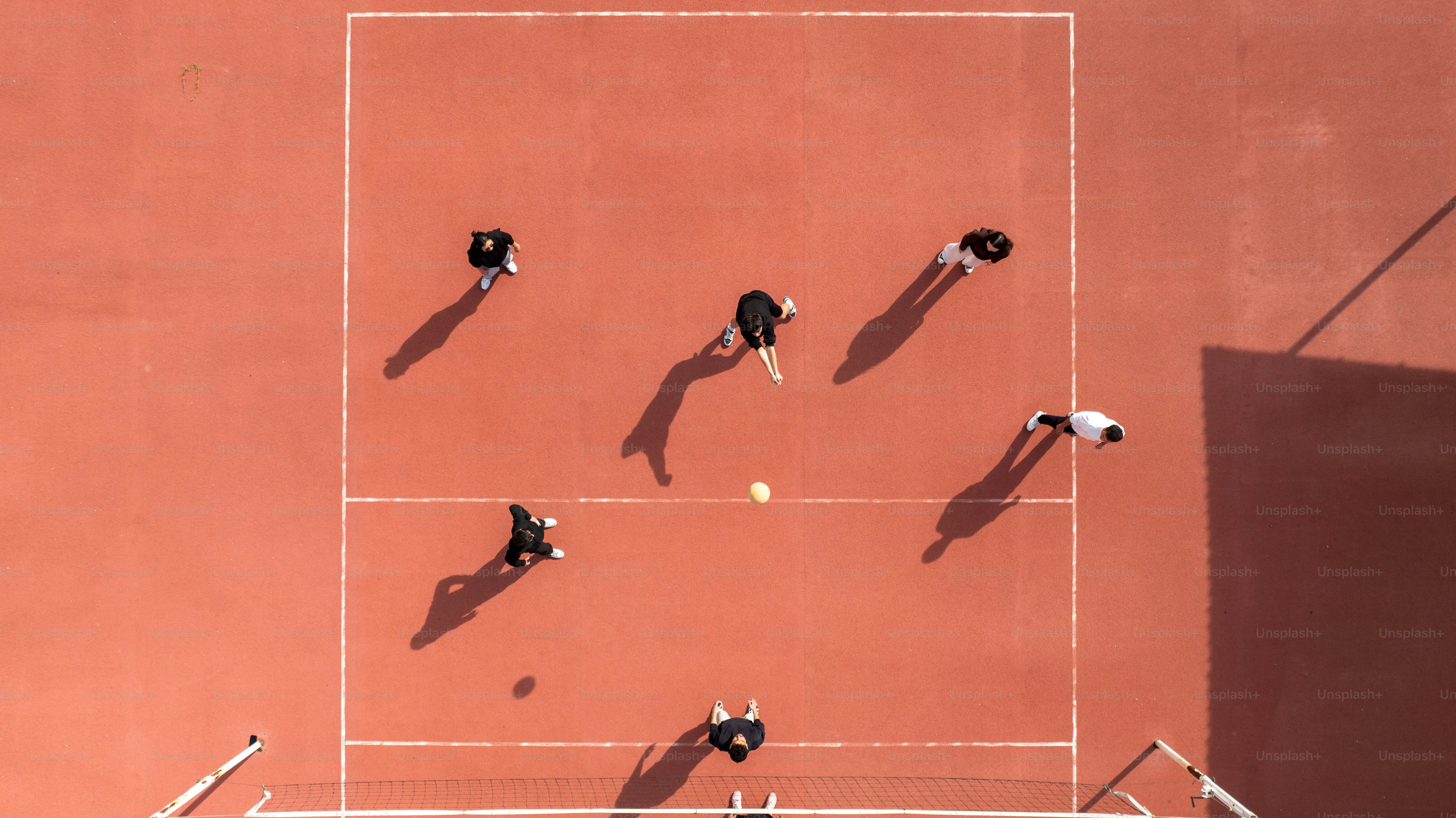 Players are shown playing tennis on the court.