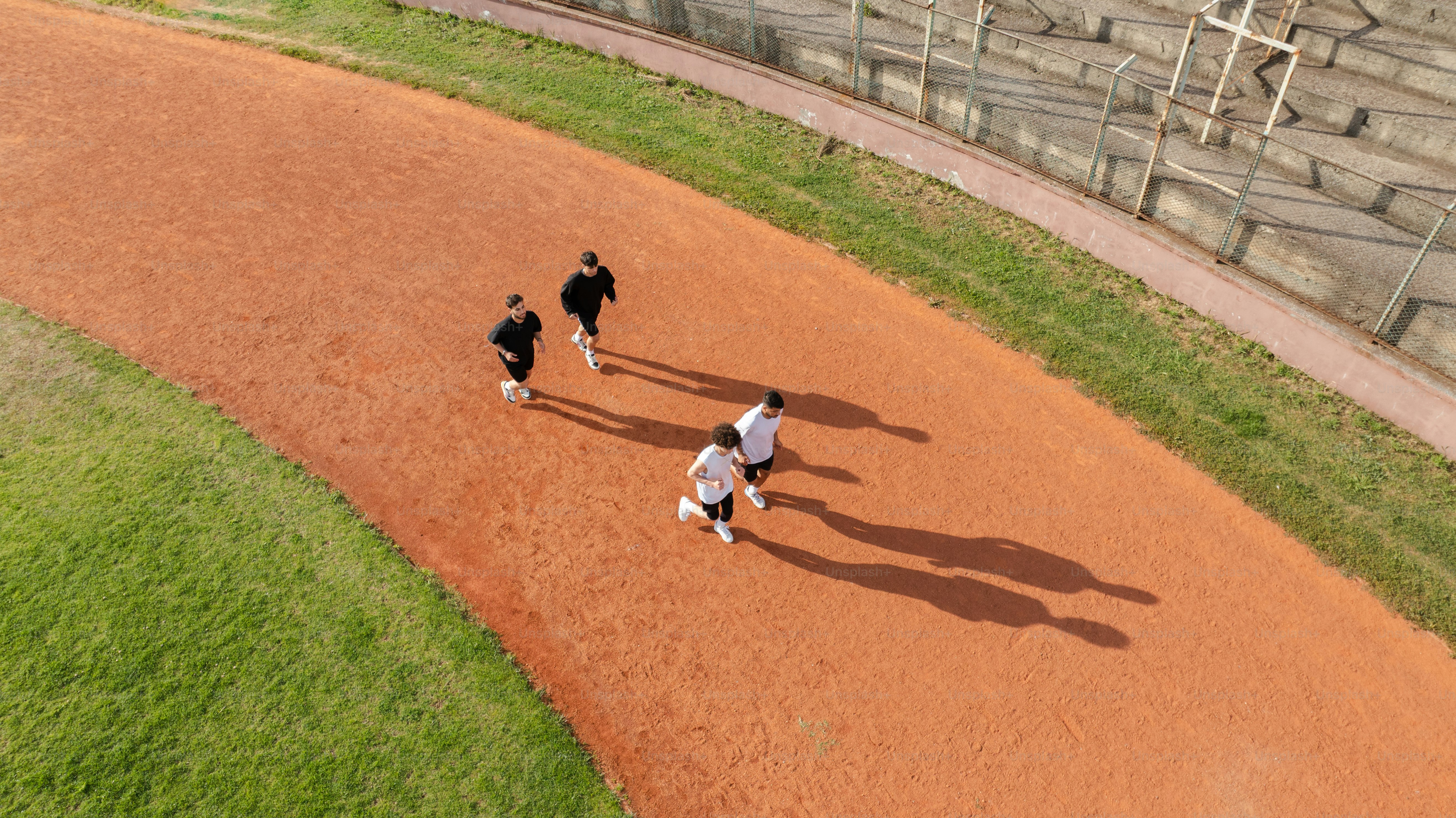 People are running on a track.