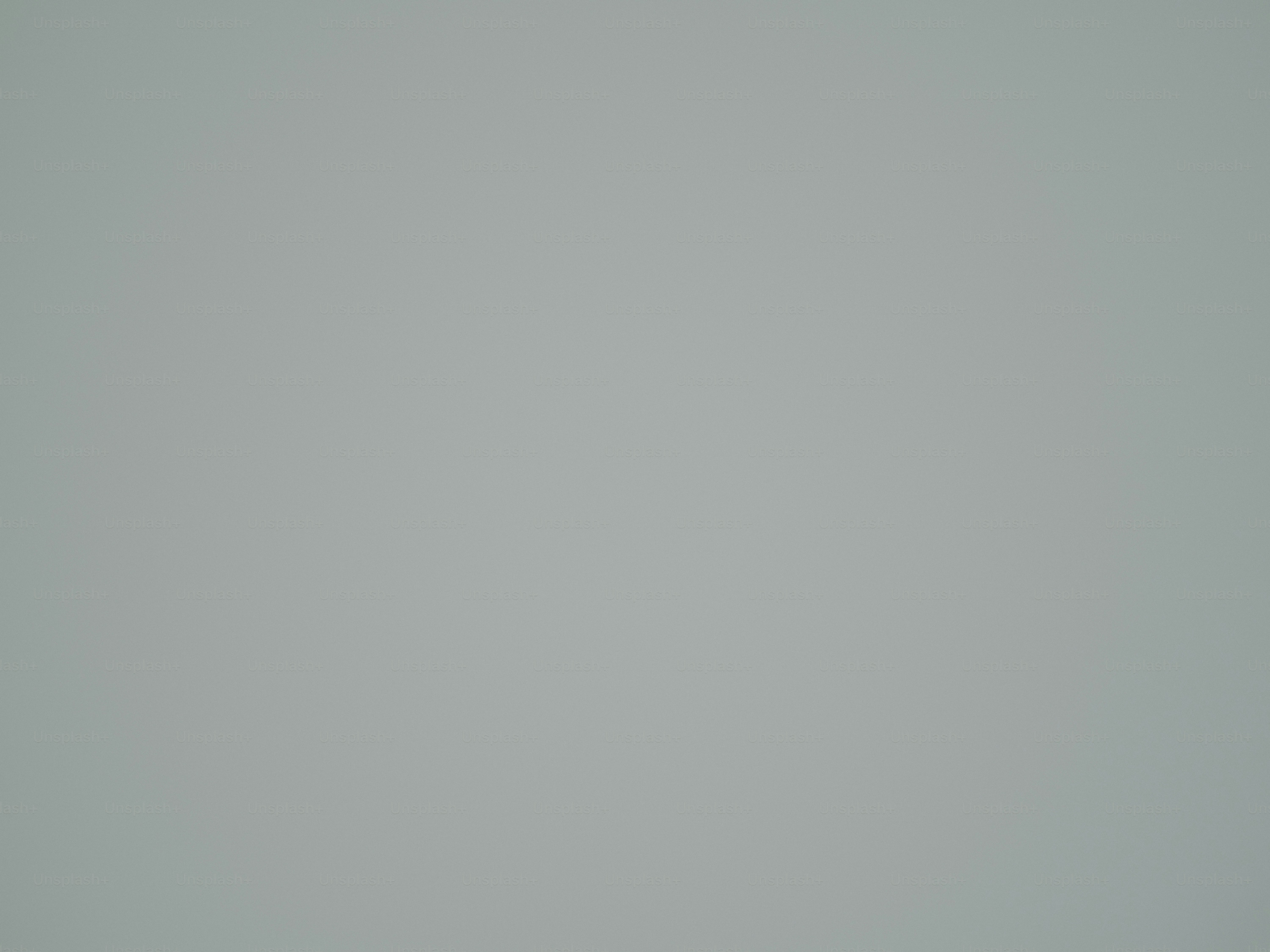 A gray, featureless background fills the image. photo – Wallpaper Image ...