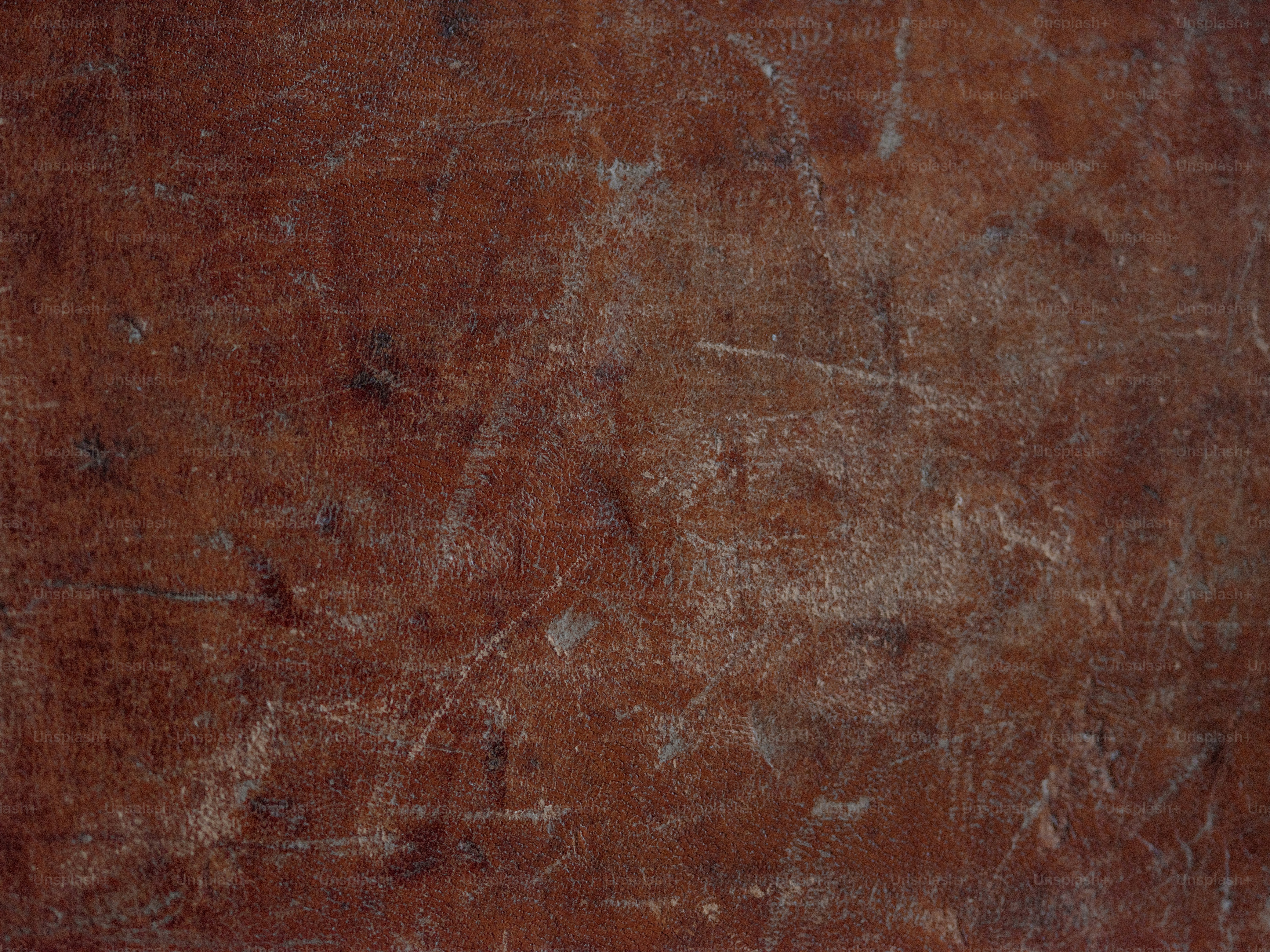 Scratched and worn brown leather texture. photo – Pattern Image on Unsplash, image size:3000x2250