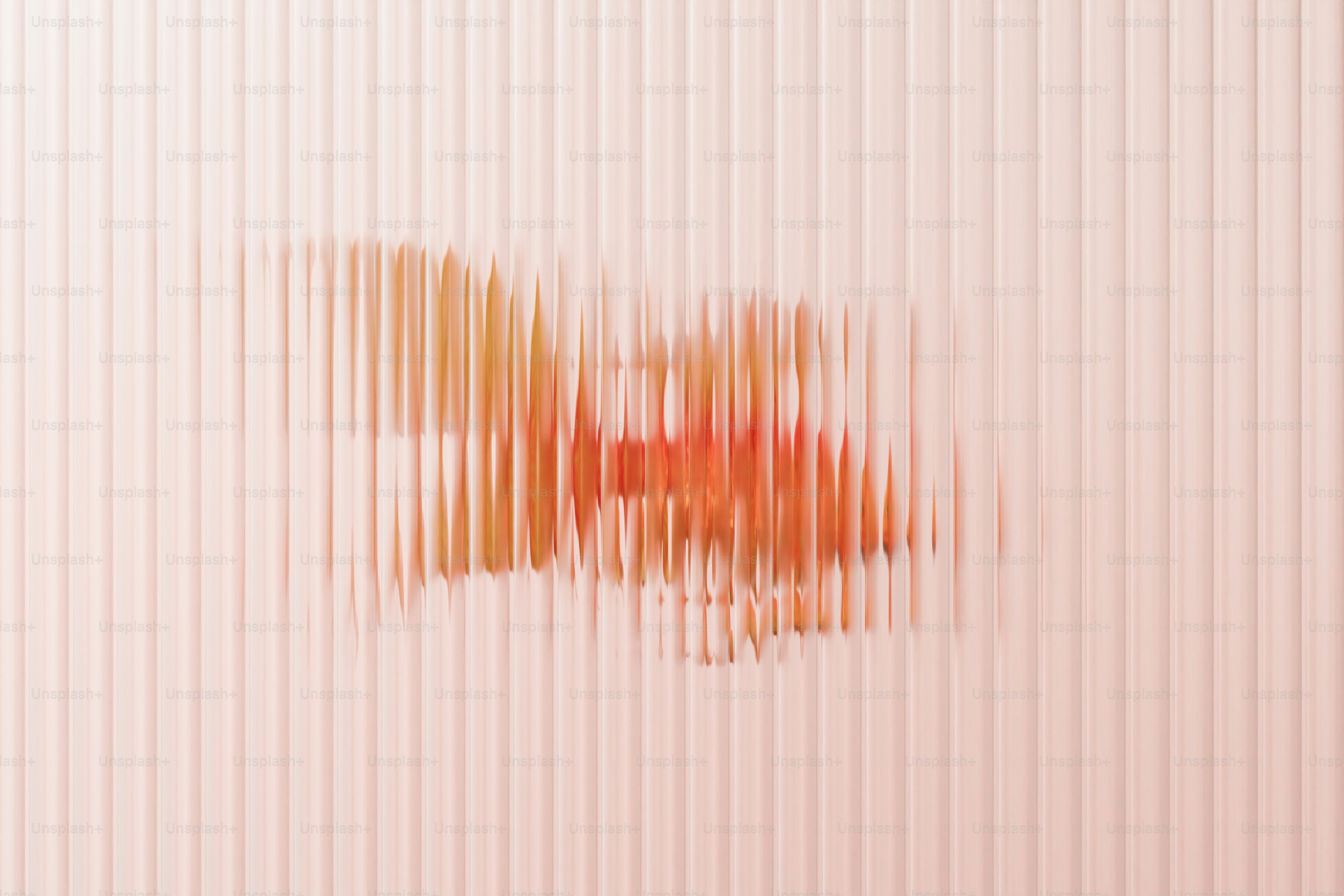 Ein verschwommenes, abstraktes Bild mit vertikalen Linien.