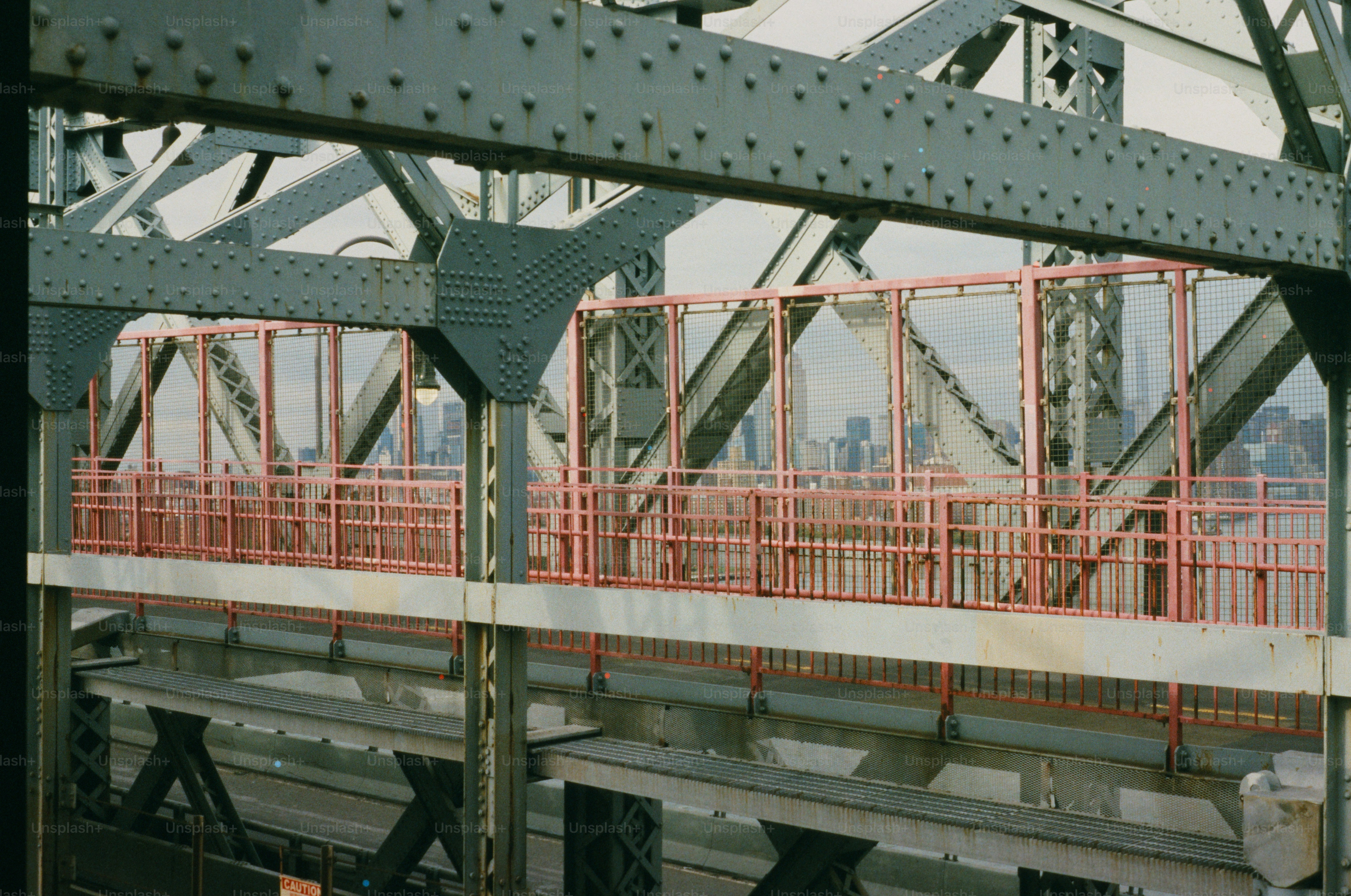A metal bridge with an intricate frame structure.