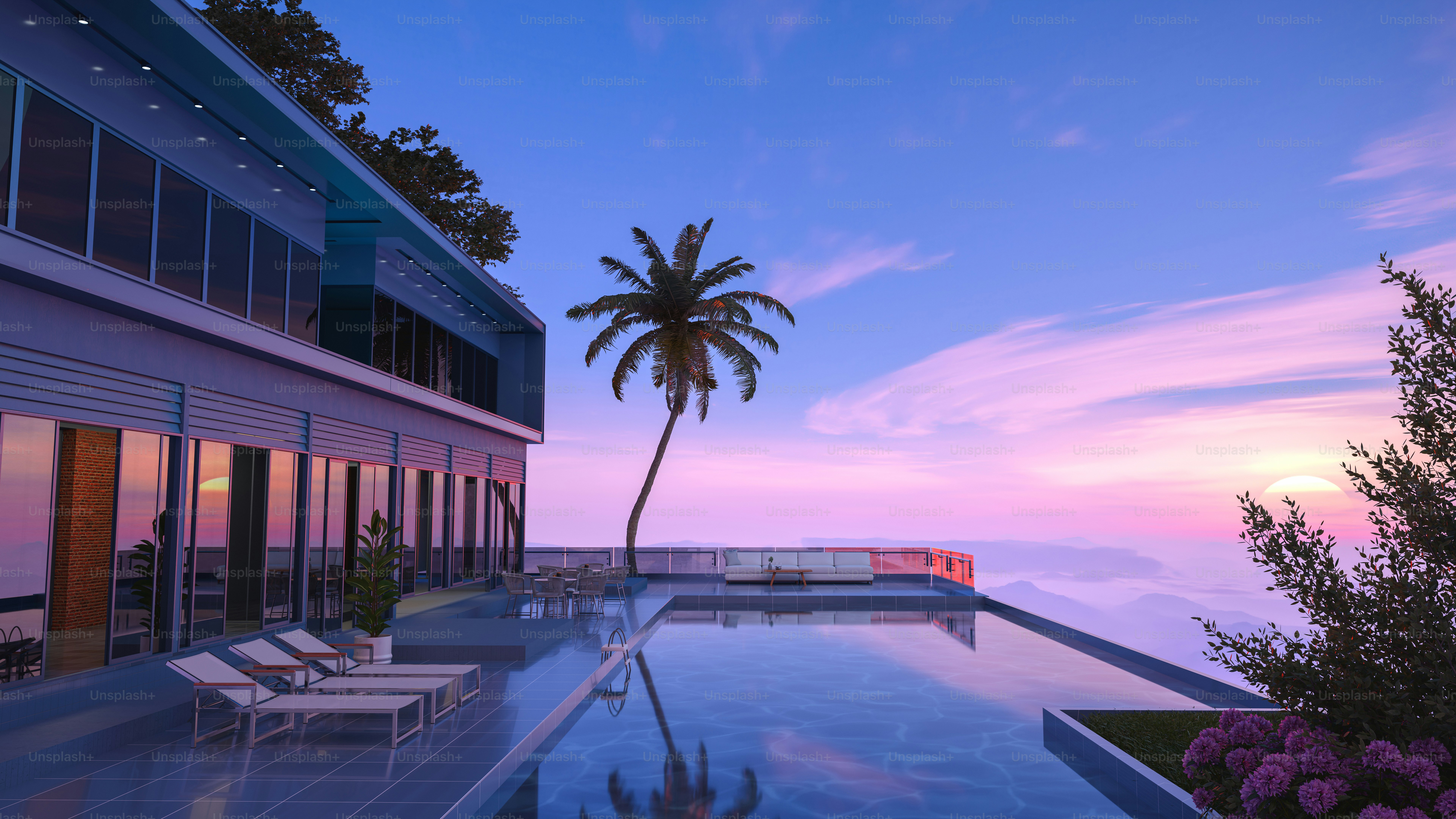 Luxury home with a pool at sunset.