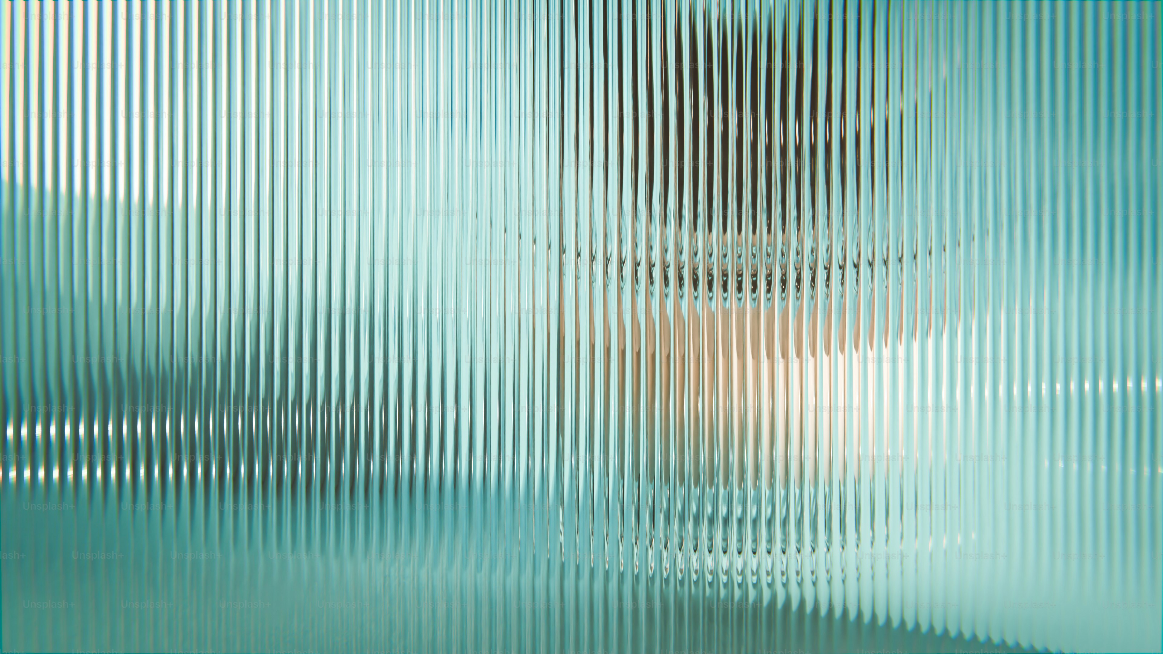 Abstract image with vertically ribbed glass and light.