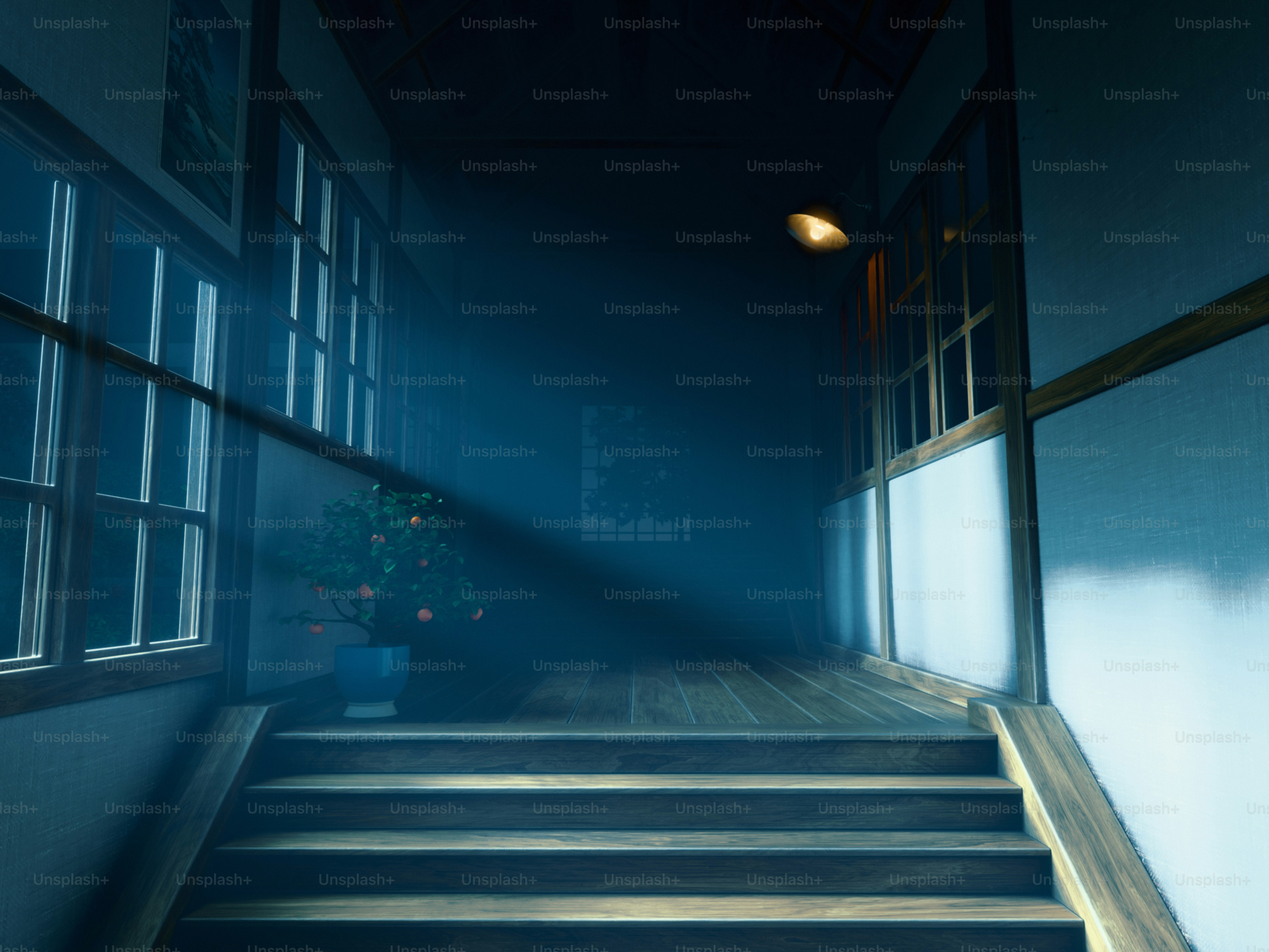 Ein dunkler Flur mit Treppe und Licht.