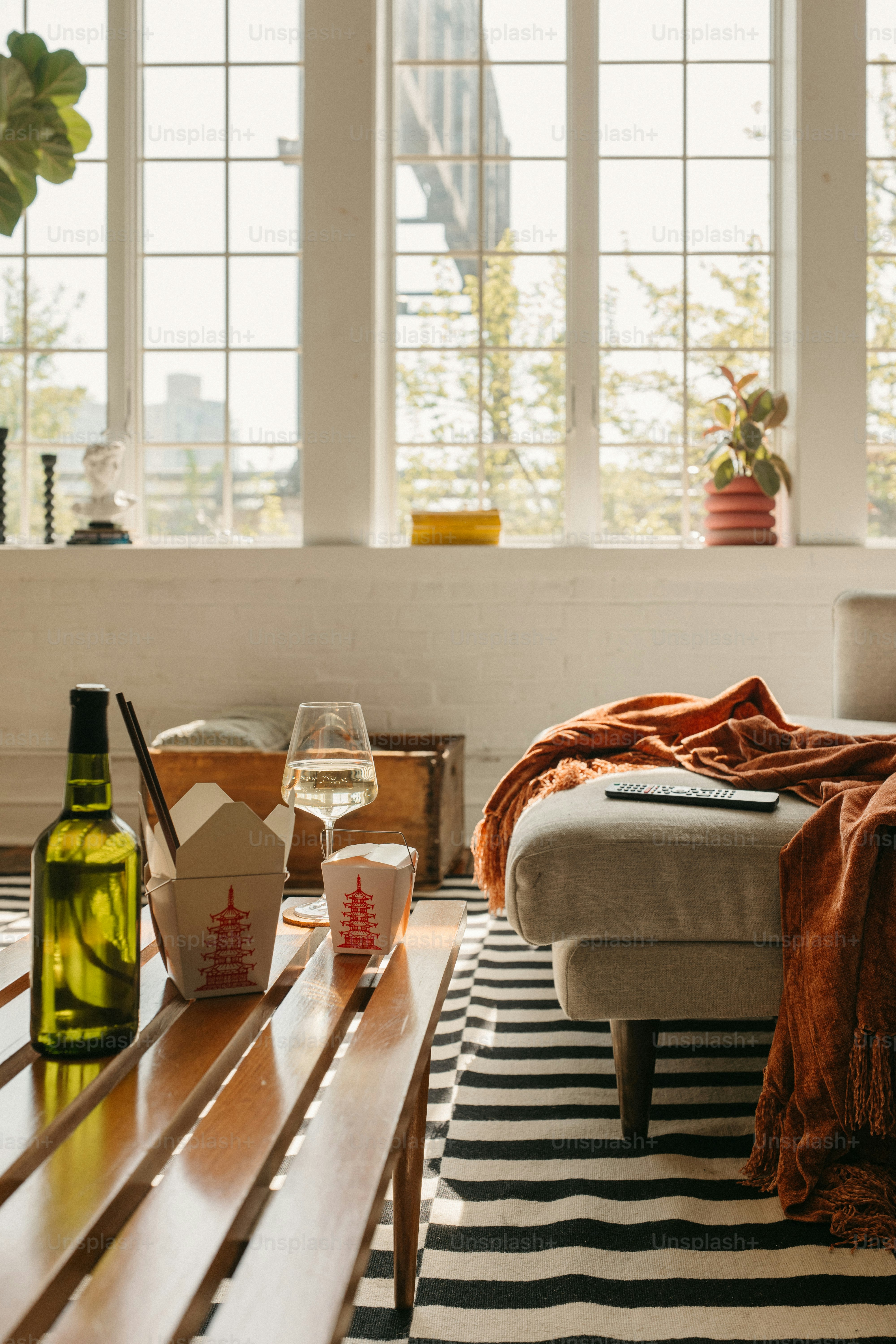 Cozy living room with takeout and relaxation.