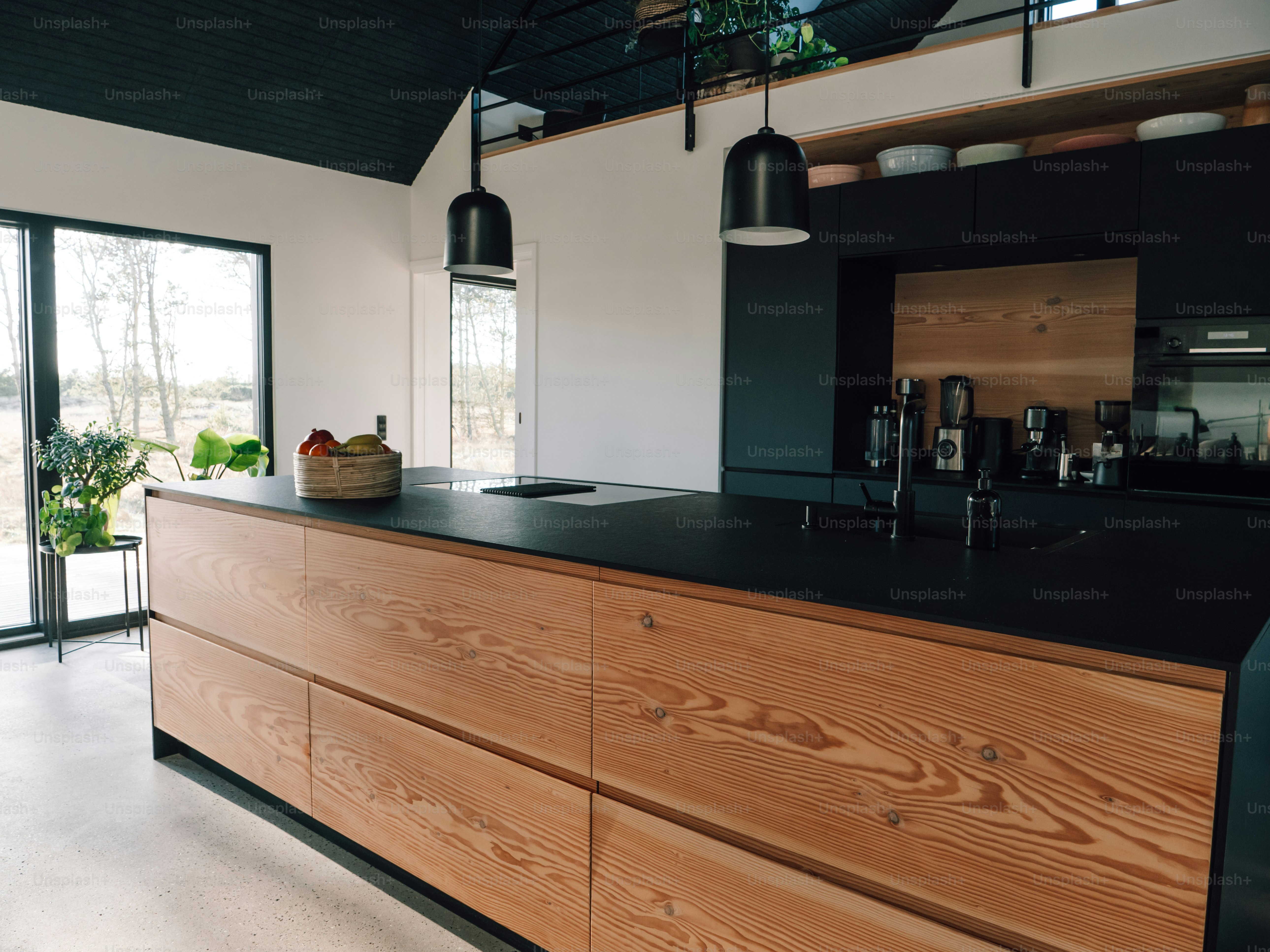Modern kitchen design with wooden cabinets and black accents. photo ...