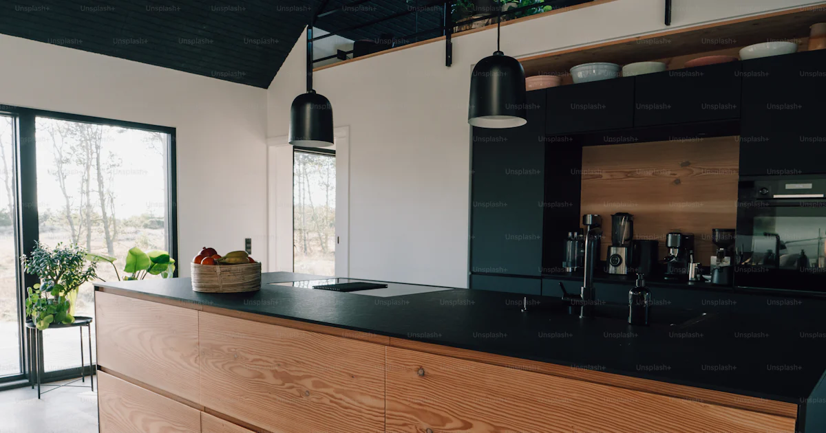 Modern kitchen design with wooden cabinets and black accents. photo ...