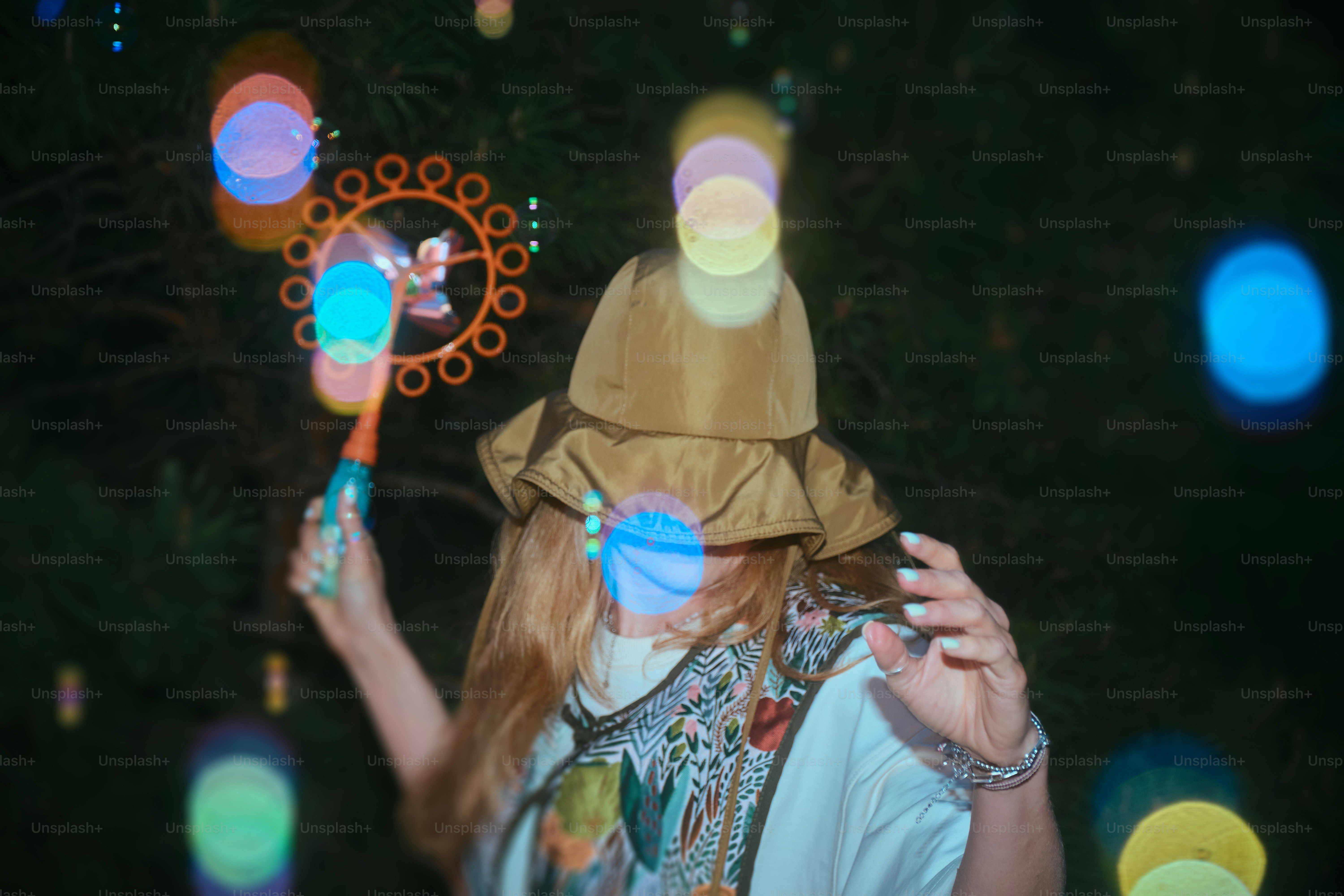 A person is playing with bubbles outdoors.