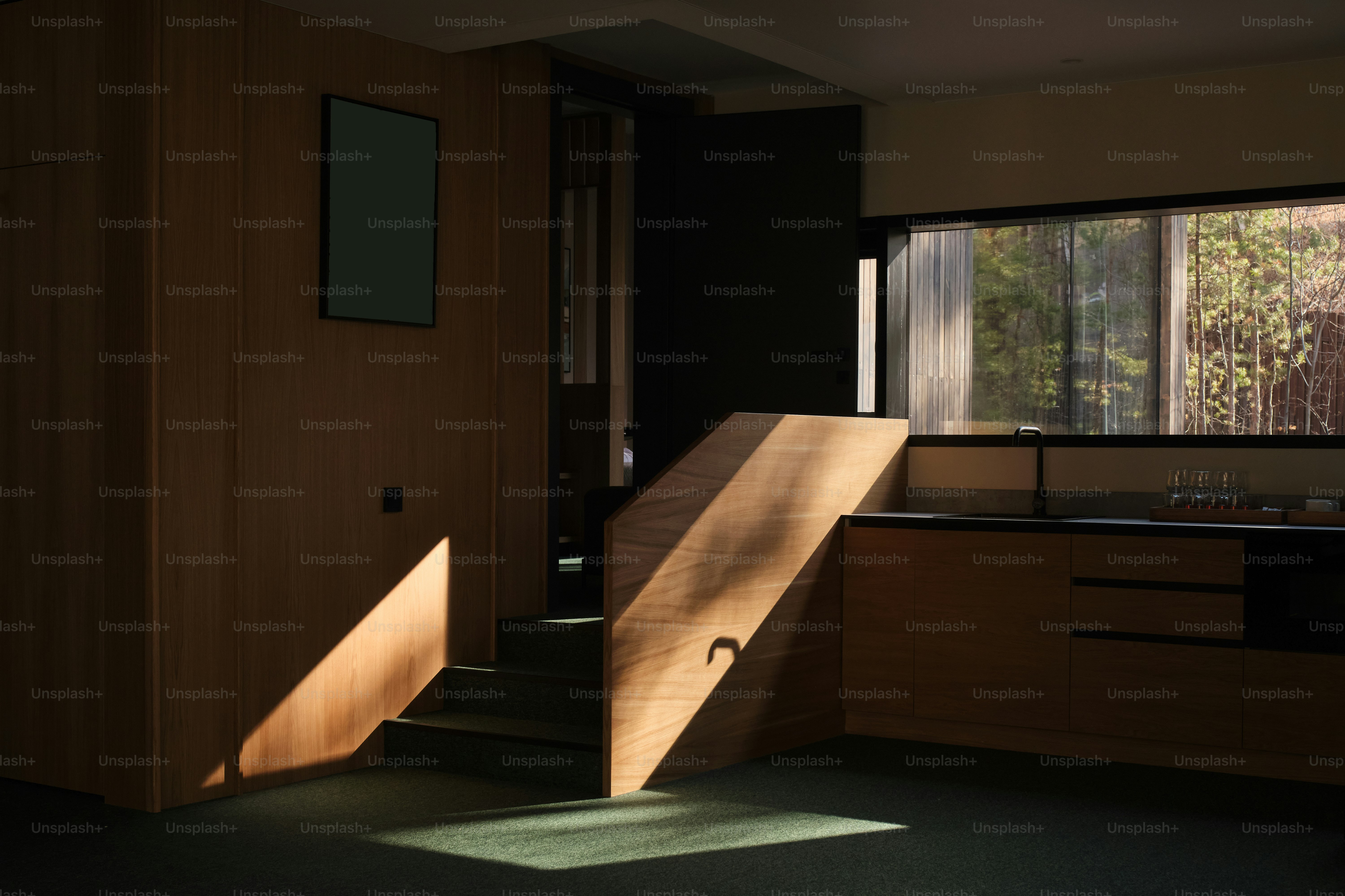 Light streams into a modern interior space.