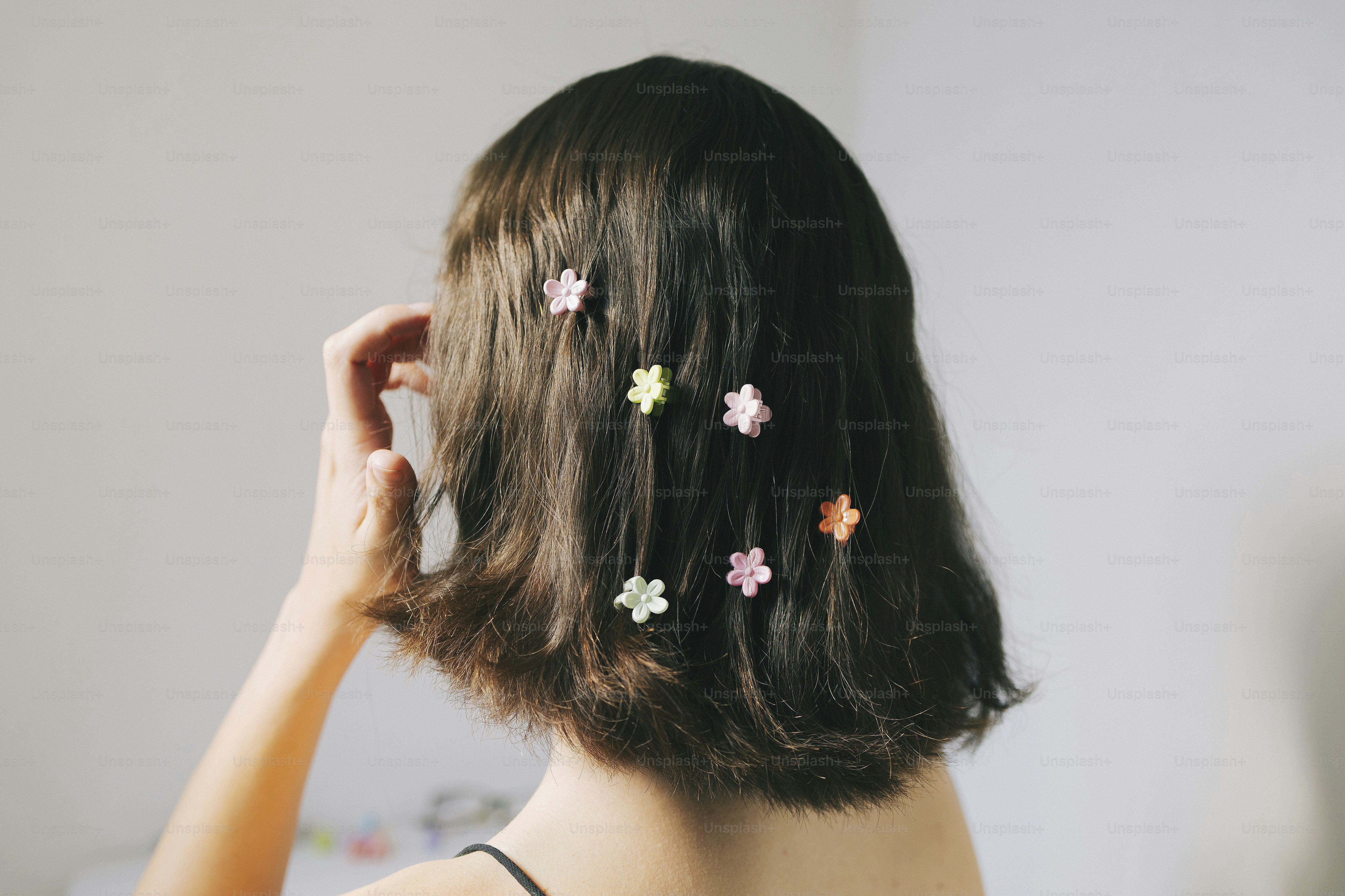 A woman with flowers in her hair.