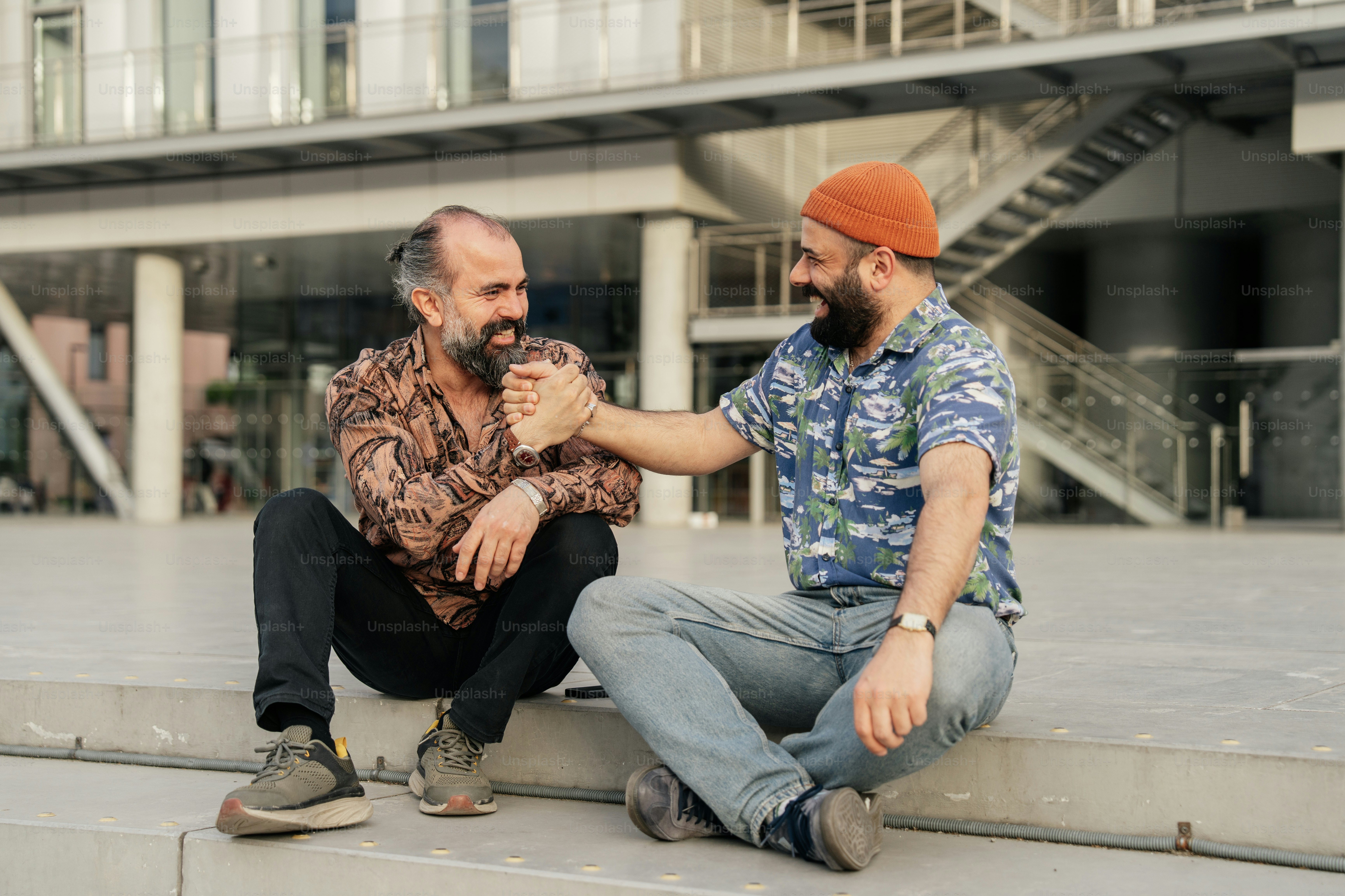 Two men share a friendly moment.