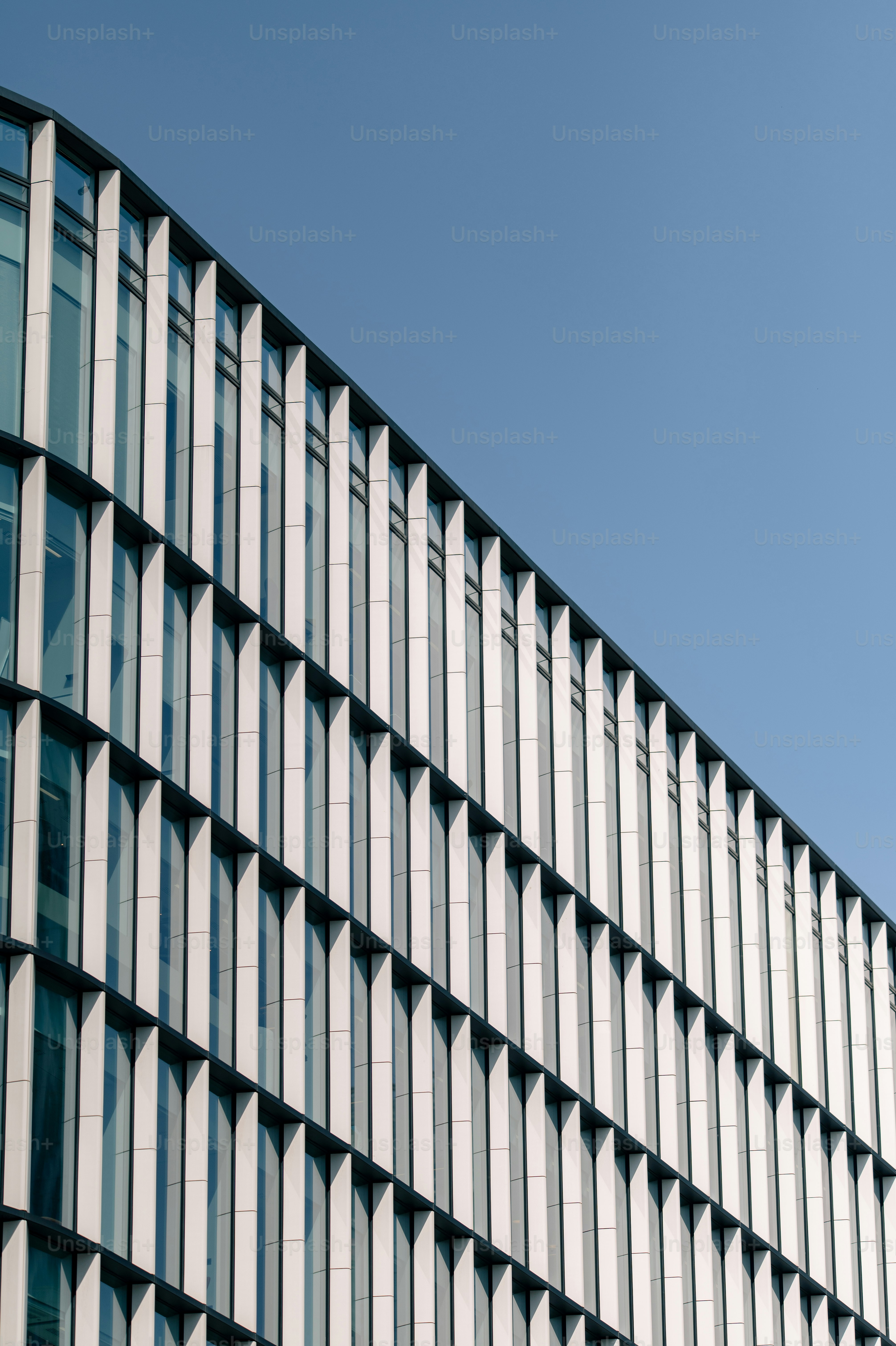 Building facade against a clear, blue sky.
