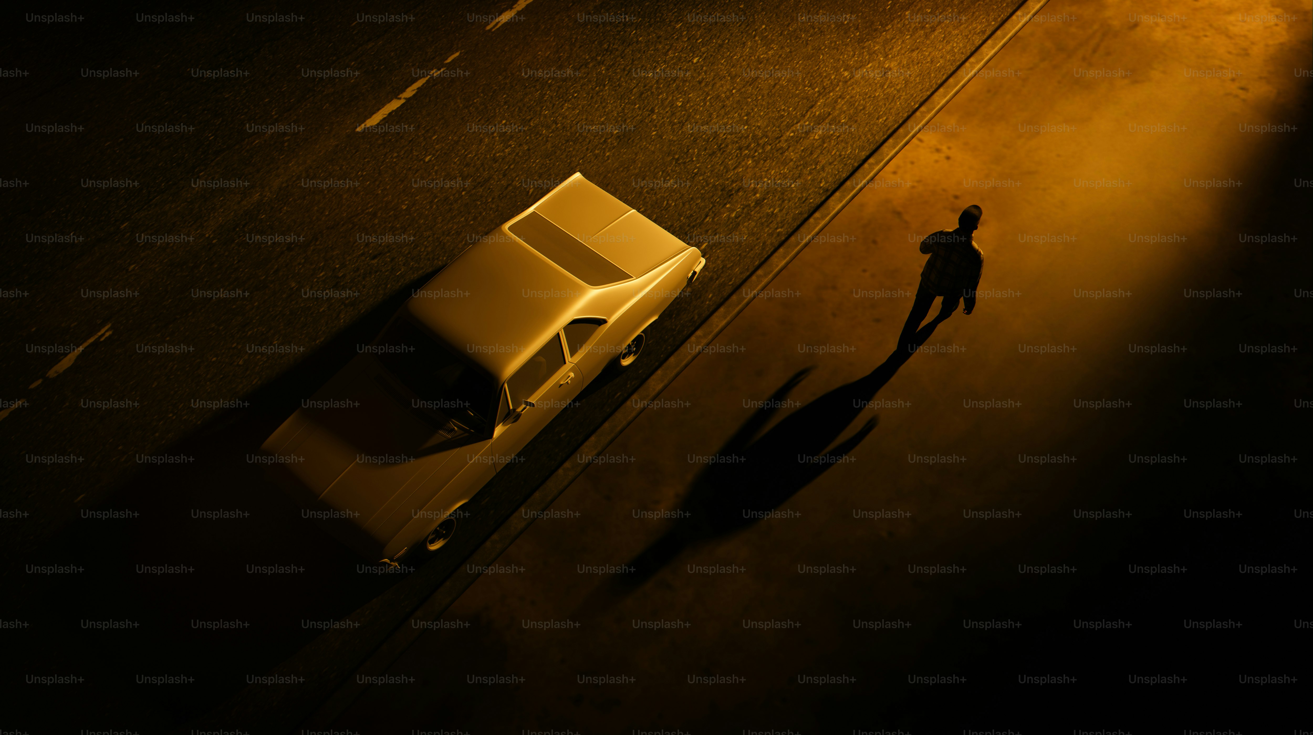 A man walks away from a car at night.