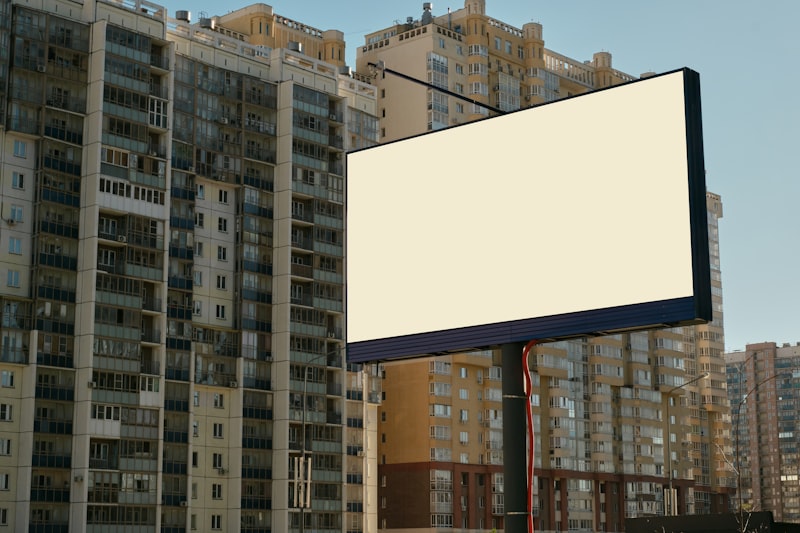 Digital bus shelter advertising display in a busy urban street