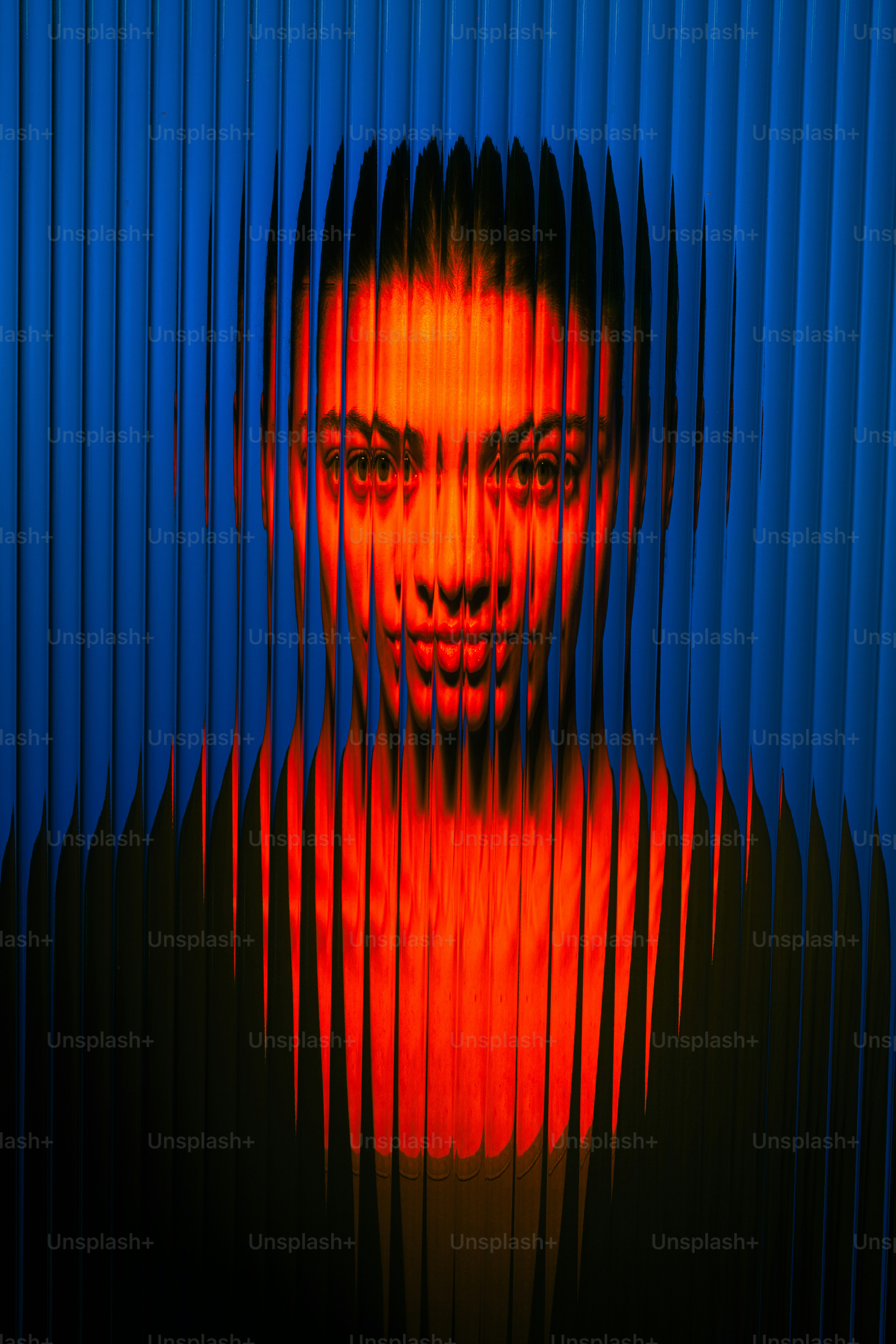 Woman's face distorted by blue and orange lights. photo – Portrait ...