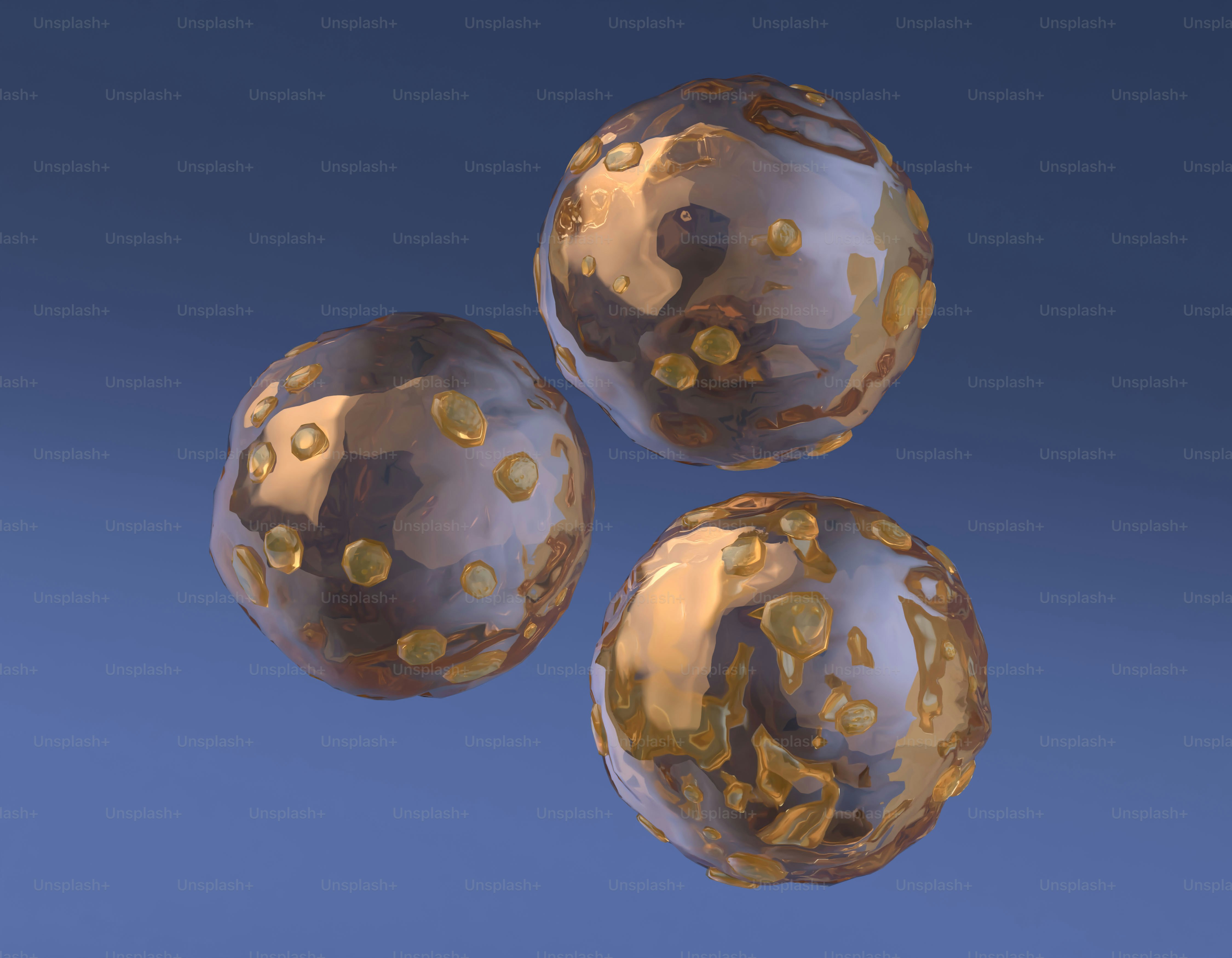 3つの金属の金色の球体が浮かんでいるのが見えます。