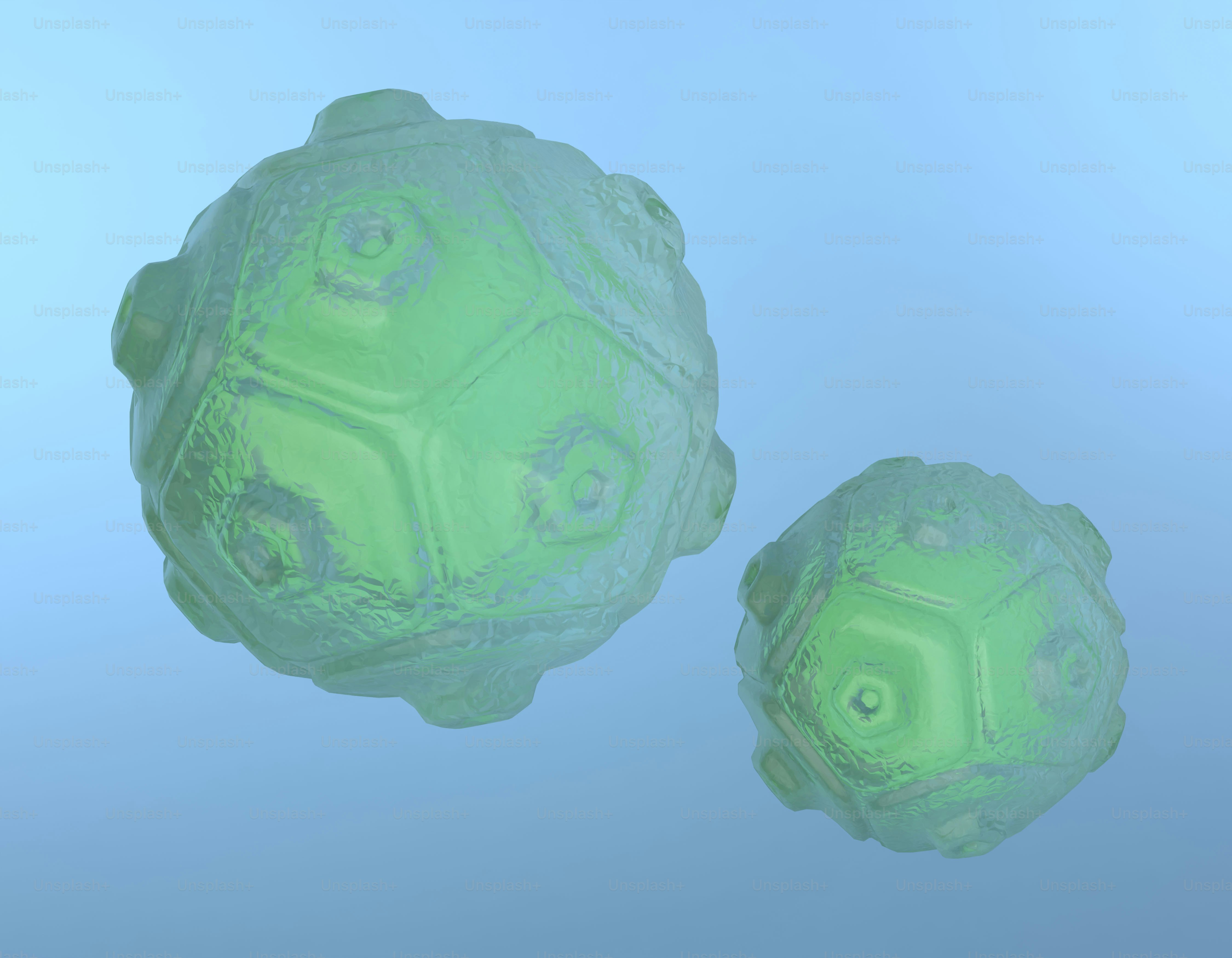 Two glowing, green geometric spheres against blue