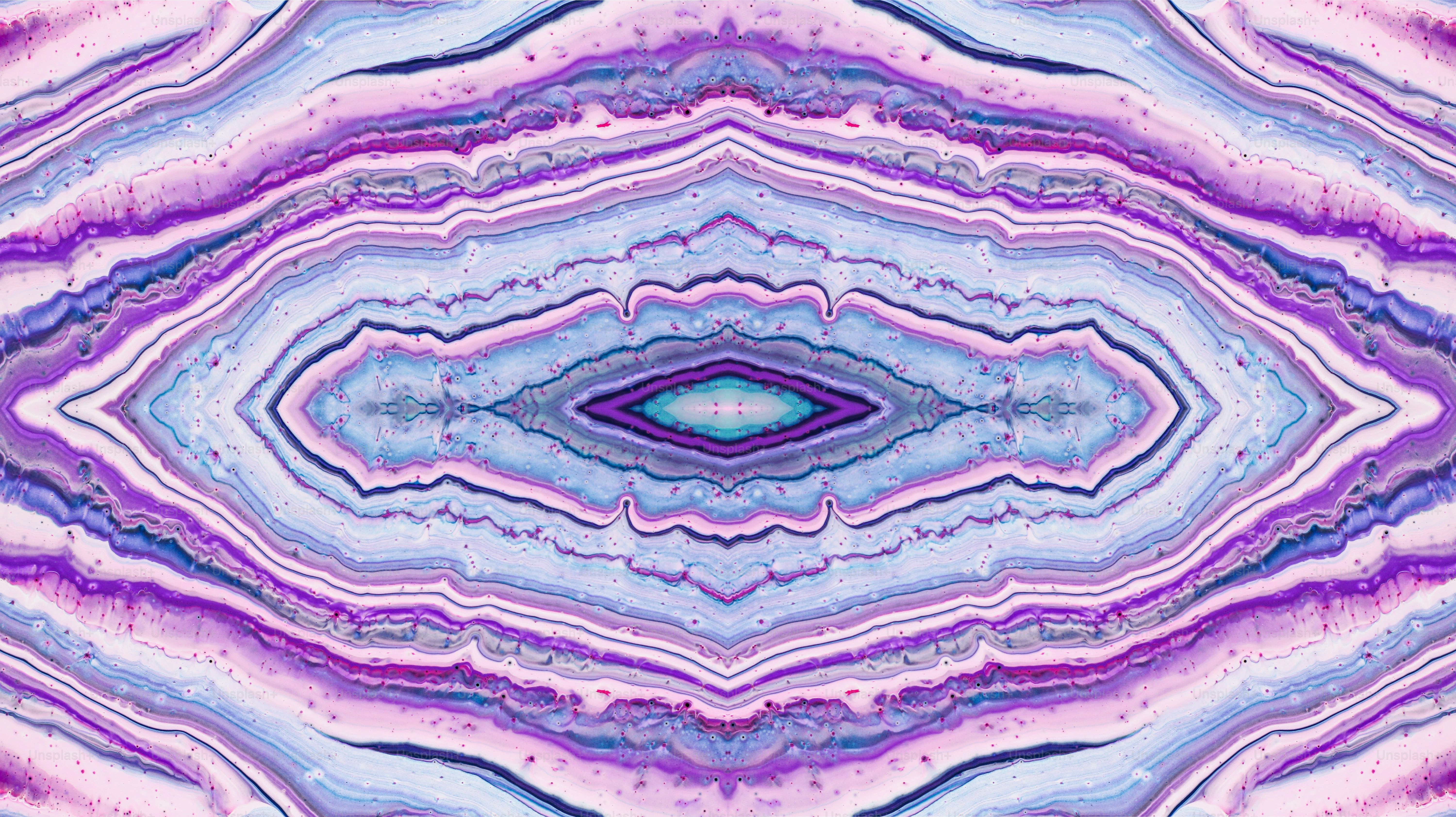 Abstract image of colorful, layered, agate-like textures.