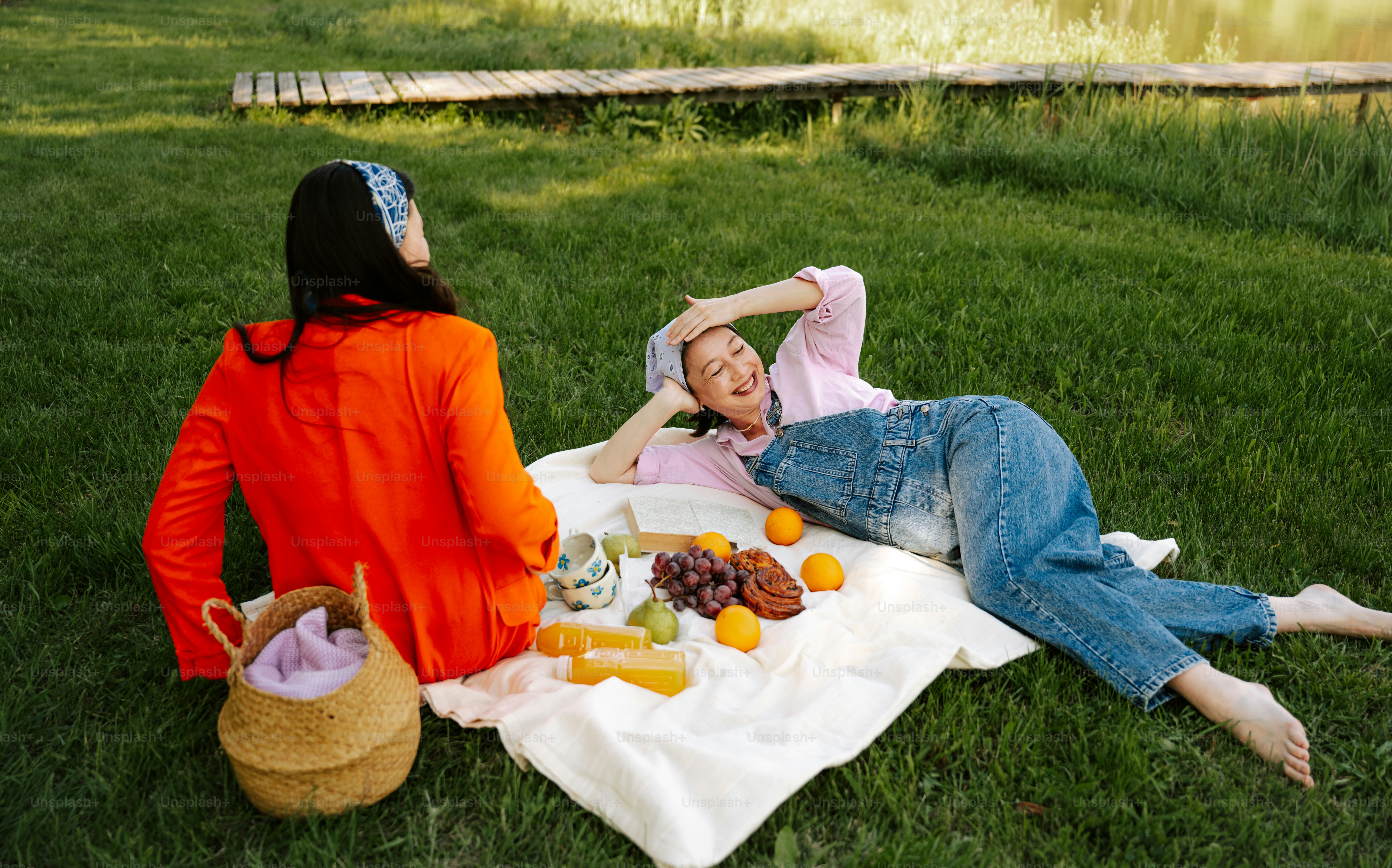 Friends enjoy a picnic on a sunny day.