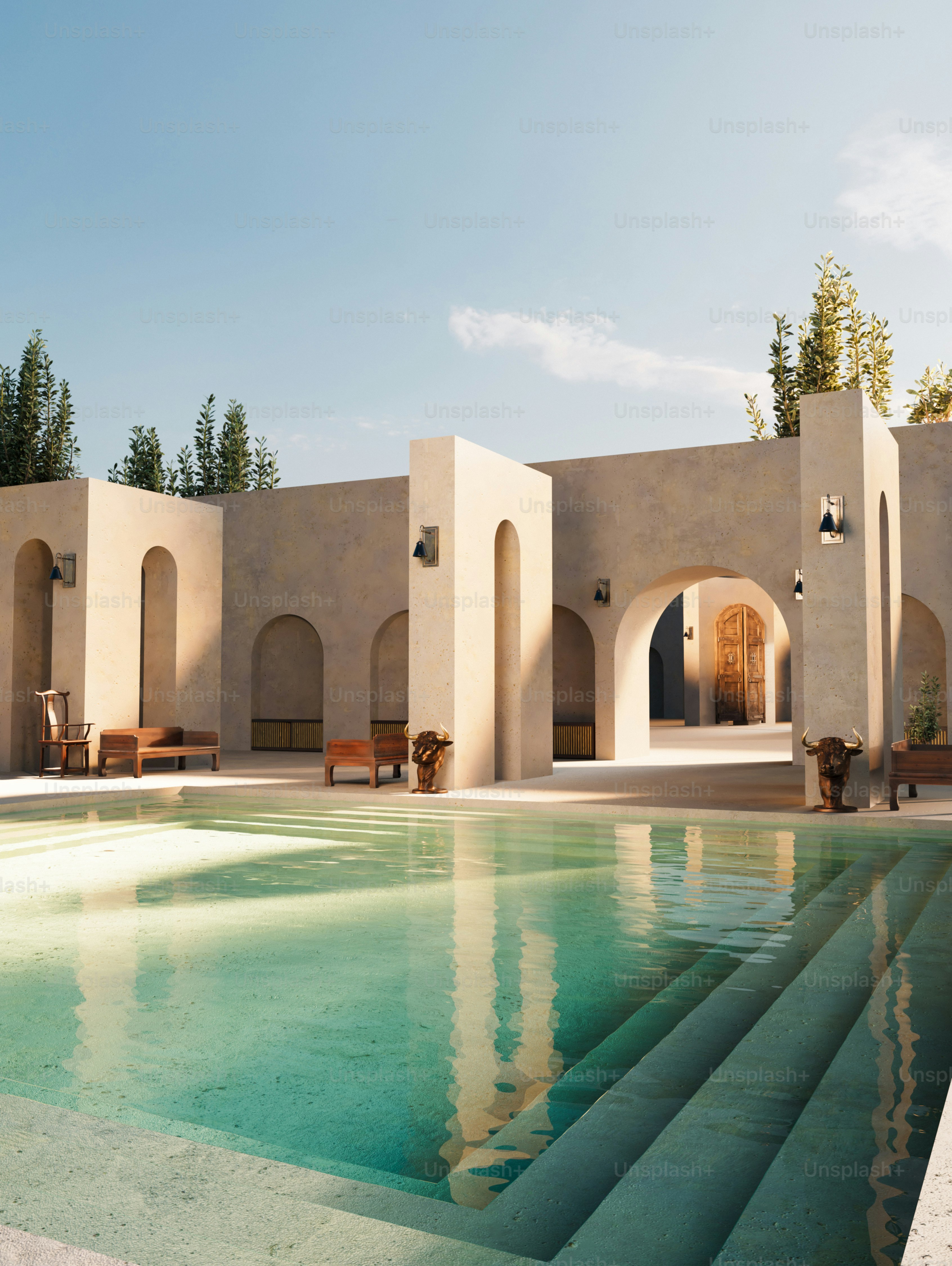 A luxurious pool with an elegant, sunlit courtyard. photo ...