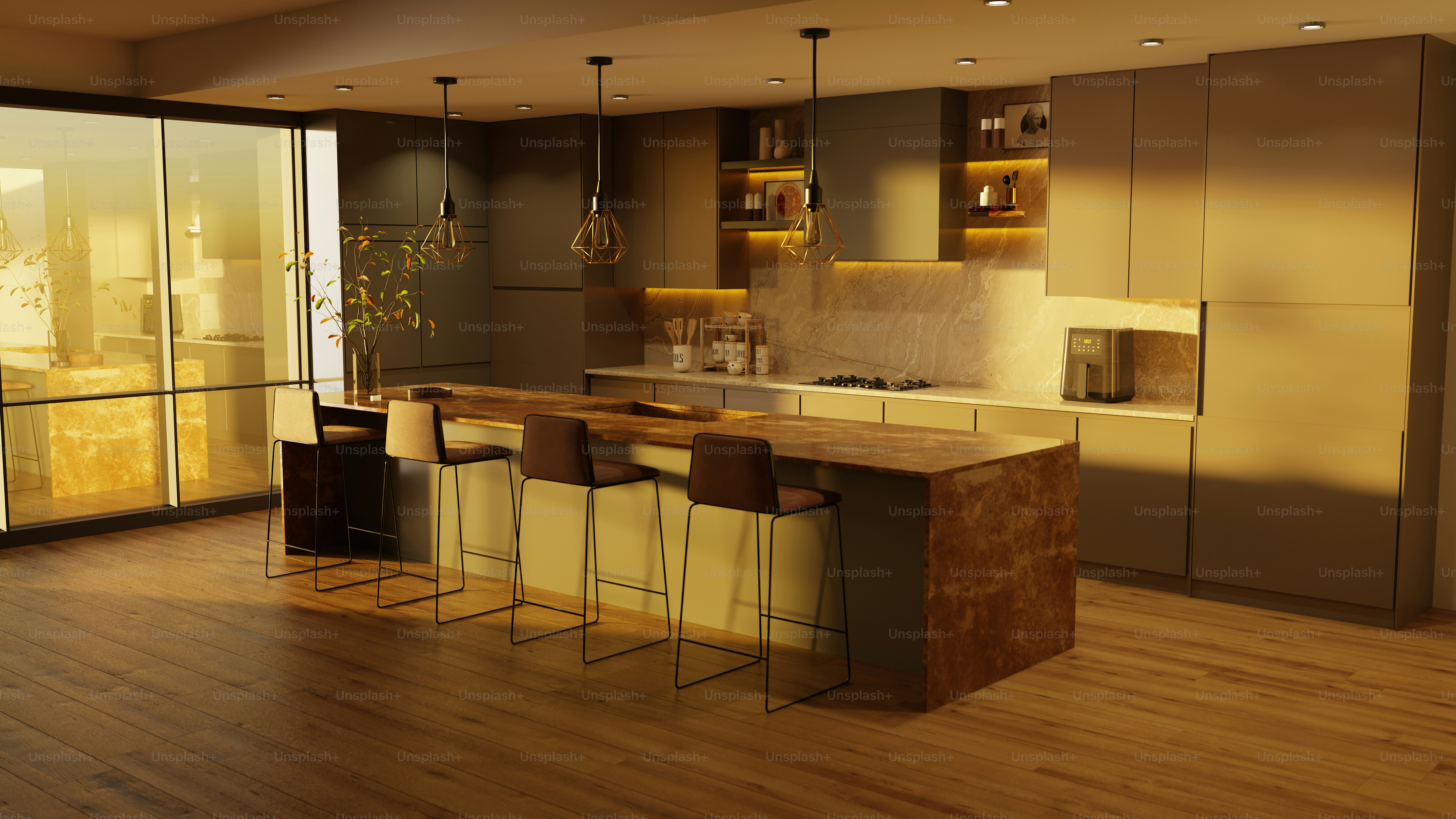 A modern kitchen has a large island and bar stools. photo ...