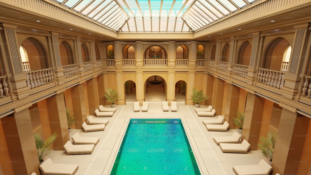 A luxurious pool is located in an elegant building.
