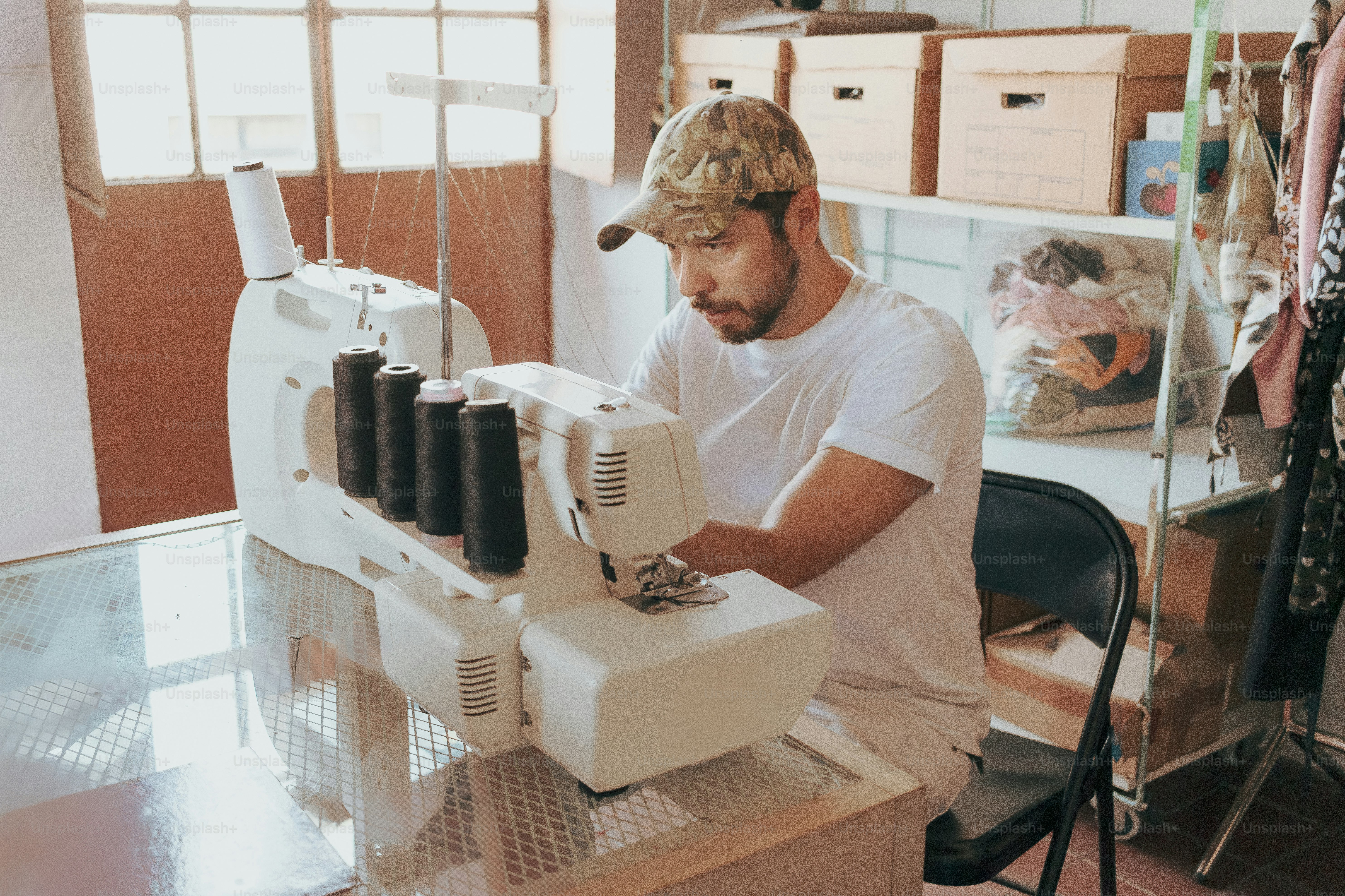 Man working on a sewing machine