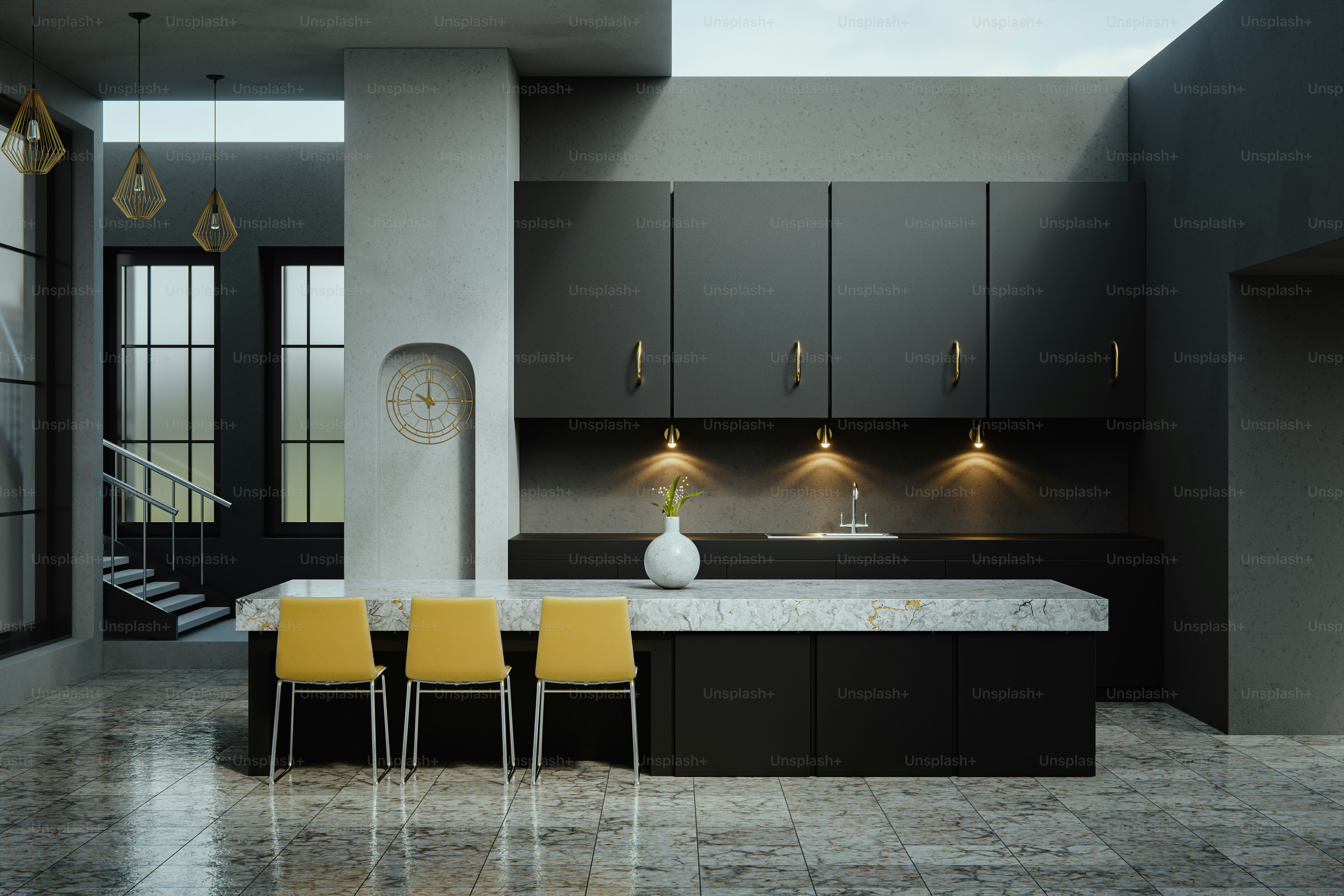 A modern kitchen with dark cabinets and yellow chairs.