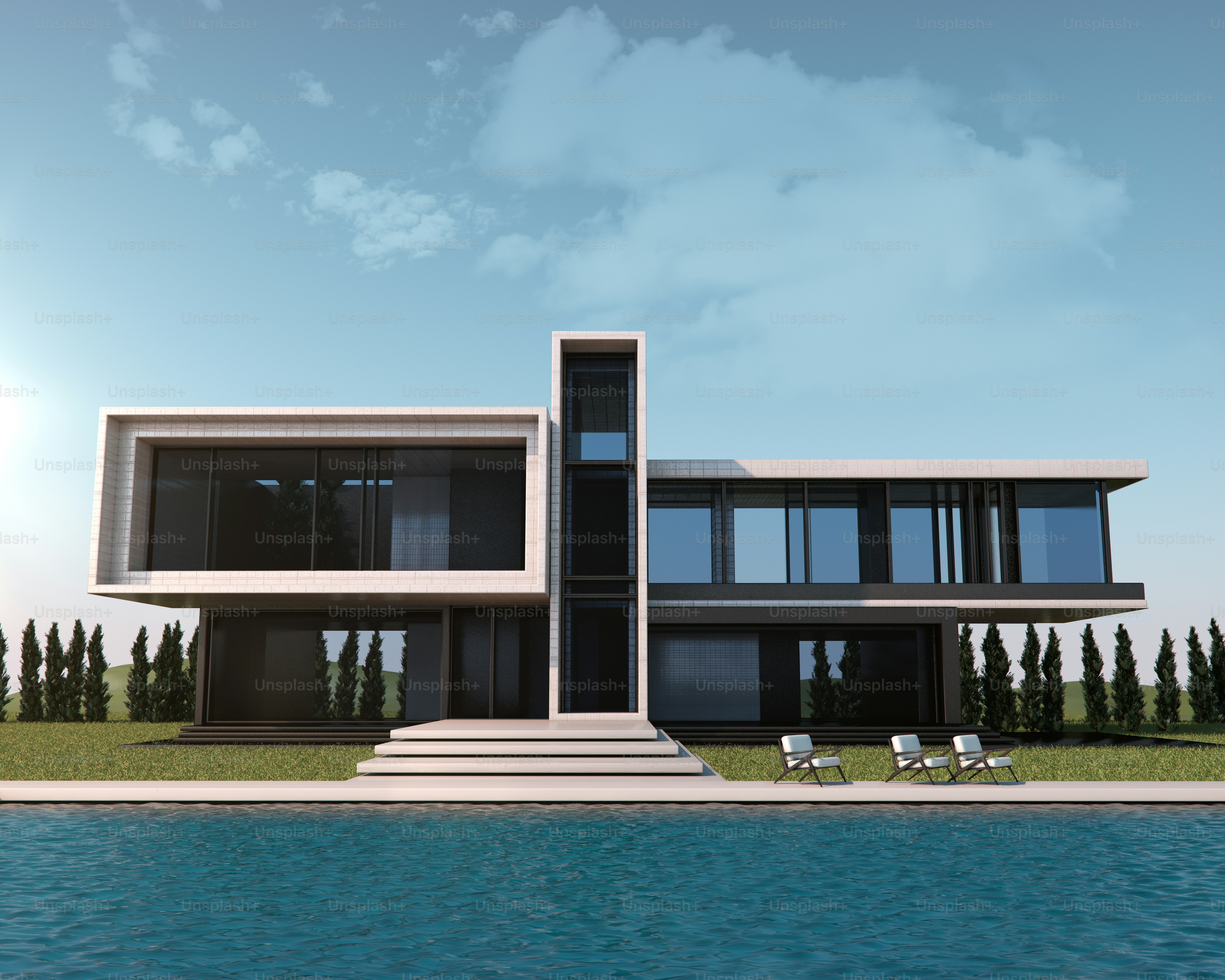 Modern house with a pool under a blue sky.