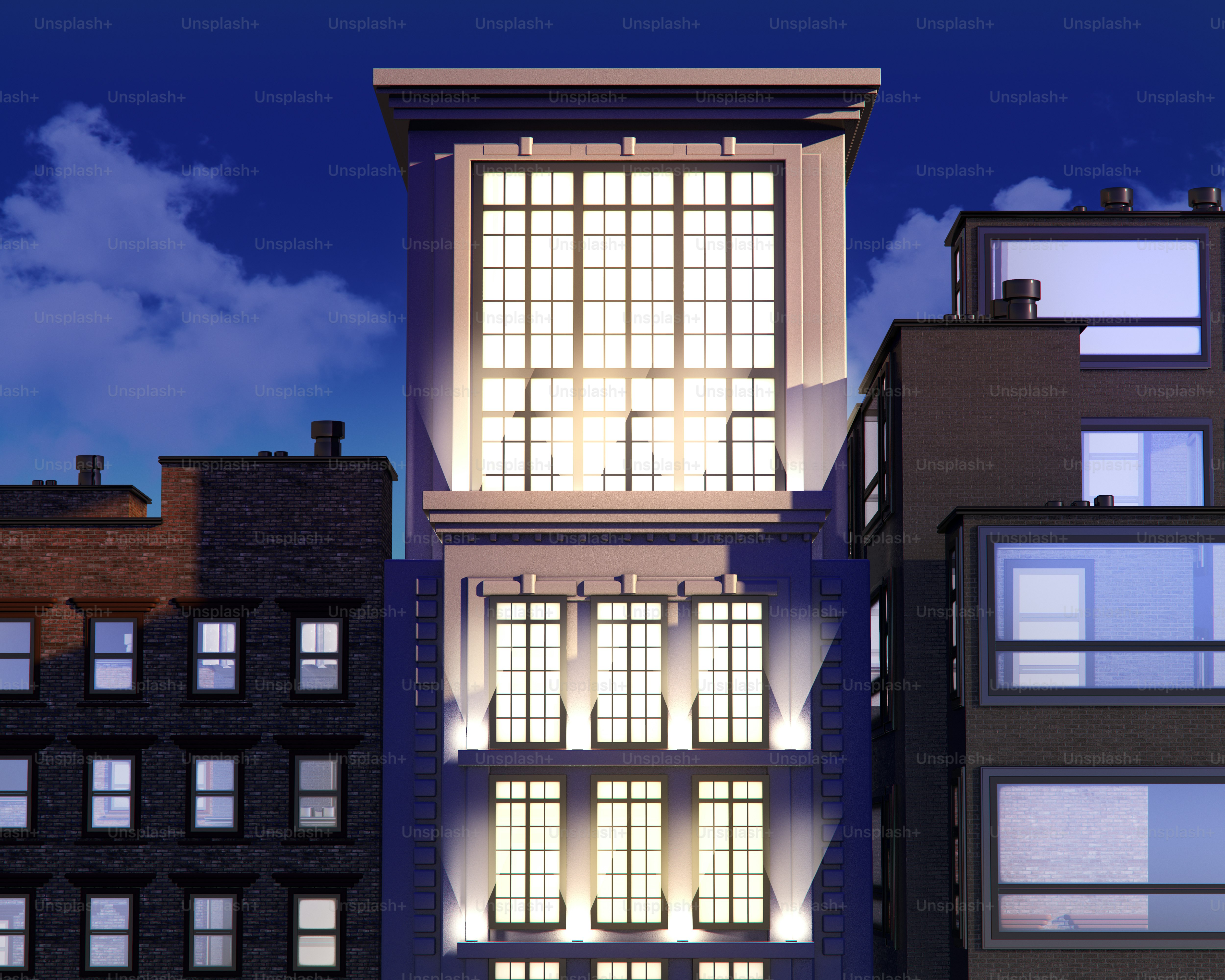 Un grand bâtiment éclairé la nuit