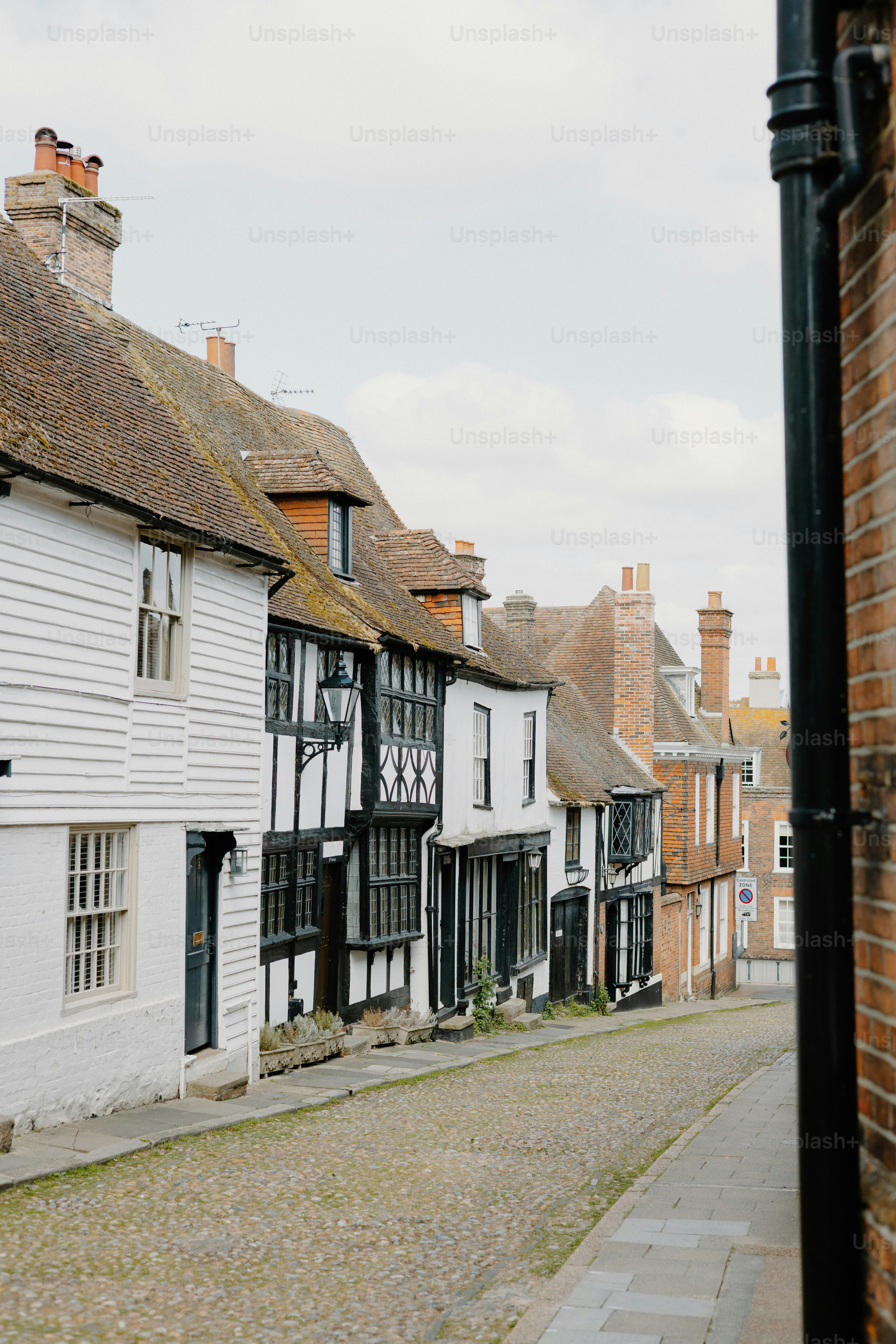 Quaint, historic street with charming buildings.