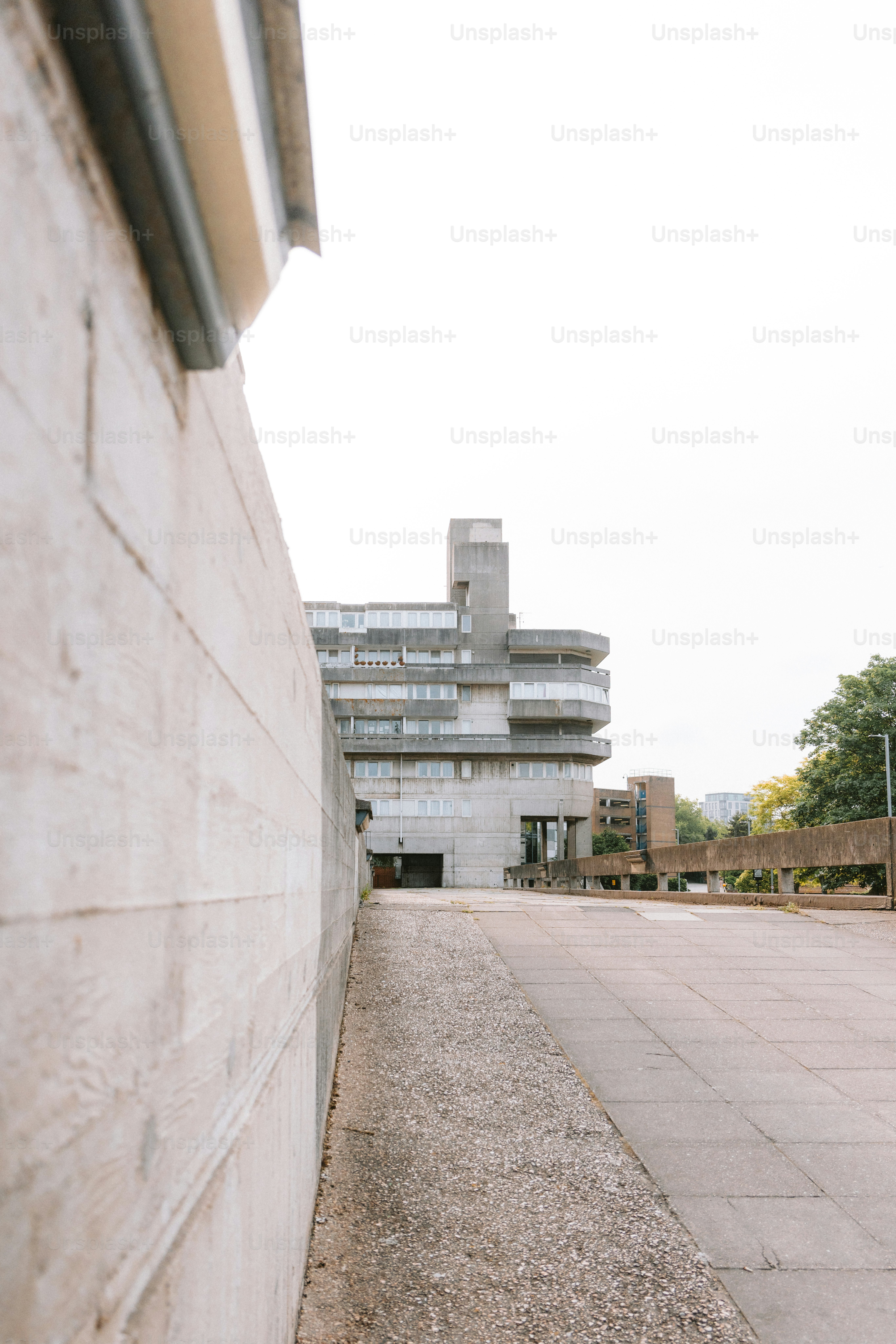 Concrete building with a pathway in the city.