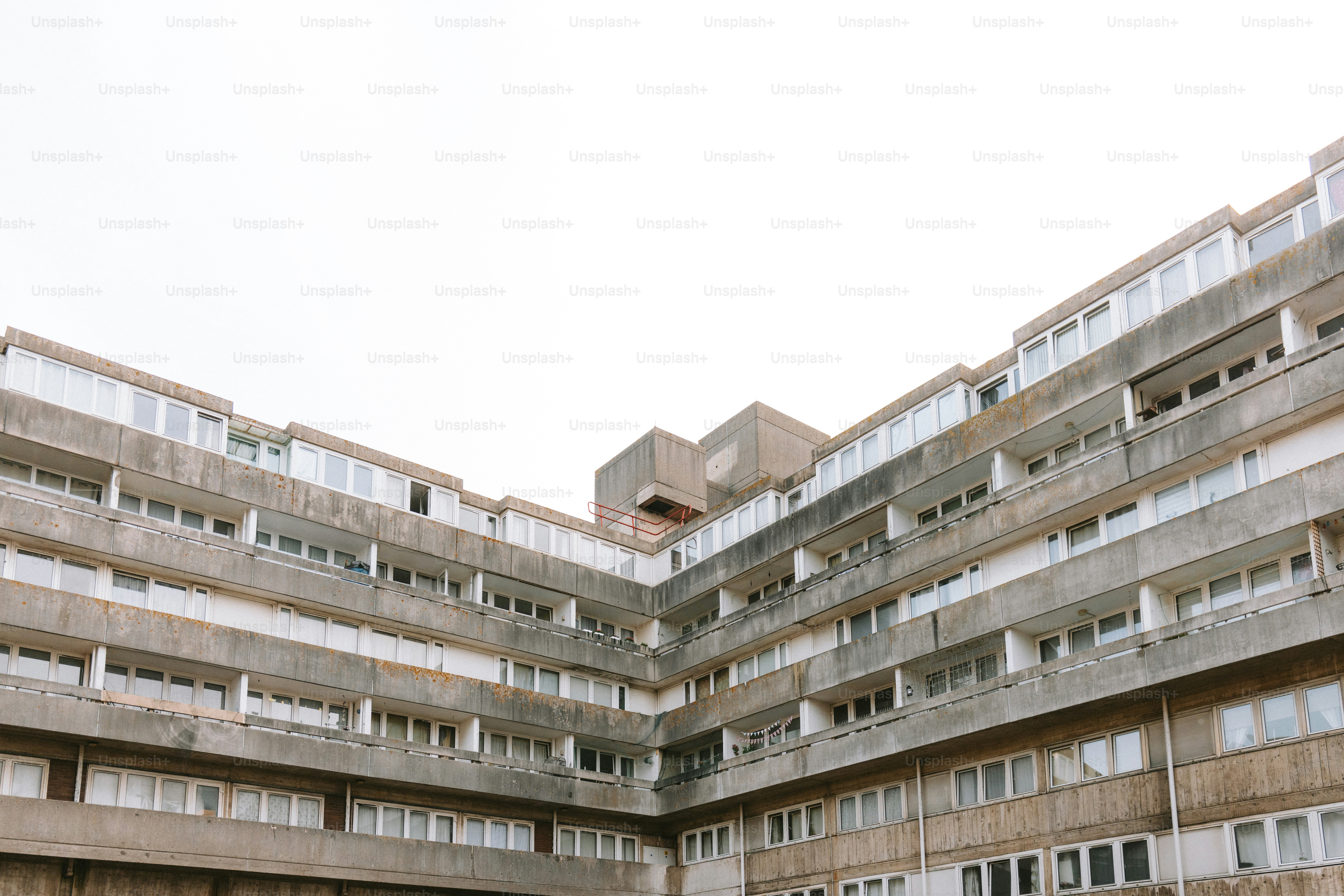 A brutalist building with many windows.