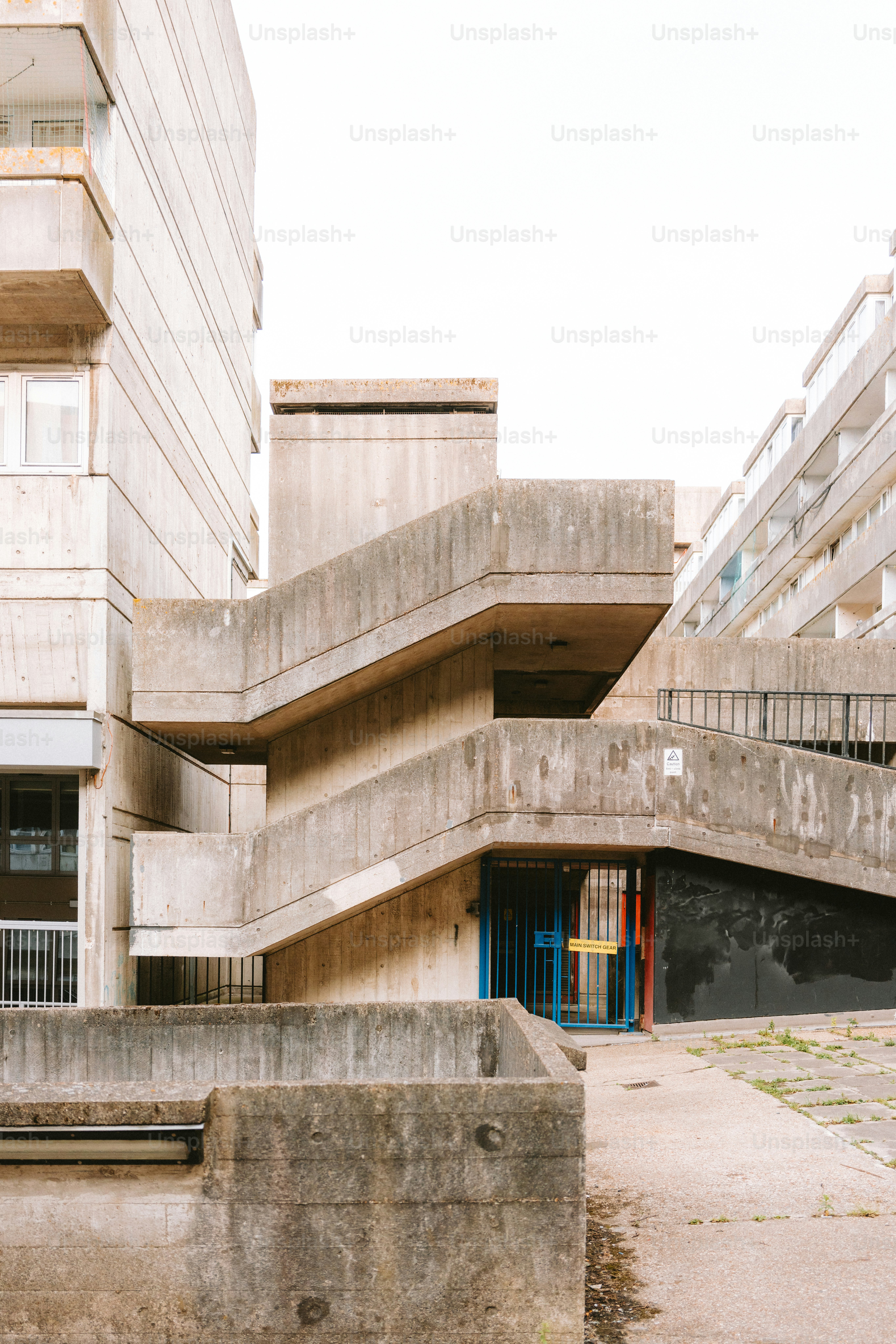 Brutalist architecture with concrete stairs and buildings.