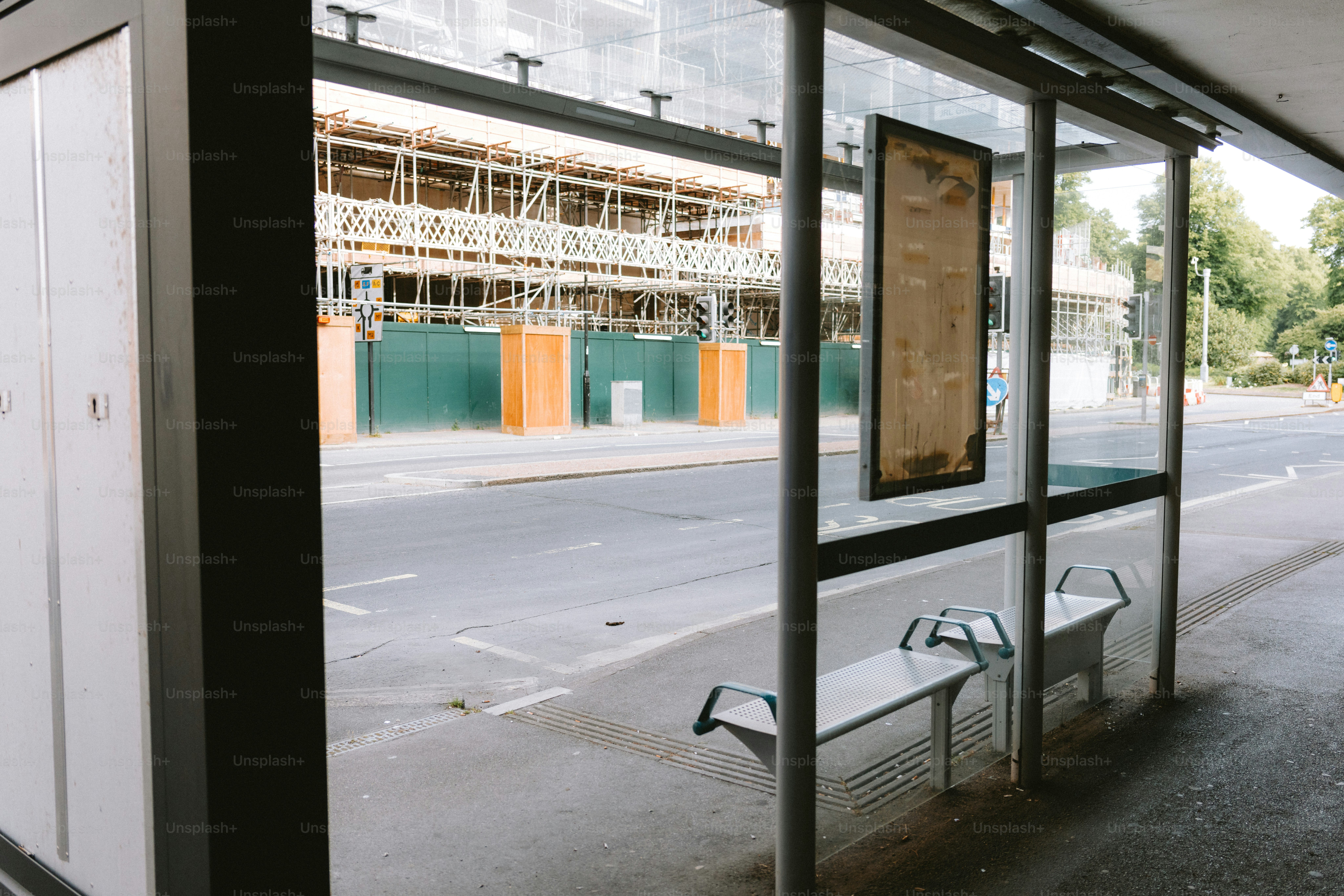 An empty bus stop awaits the next bus.
