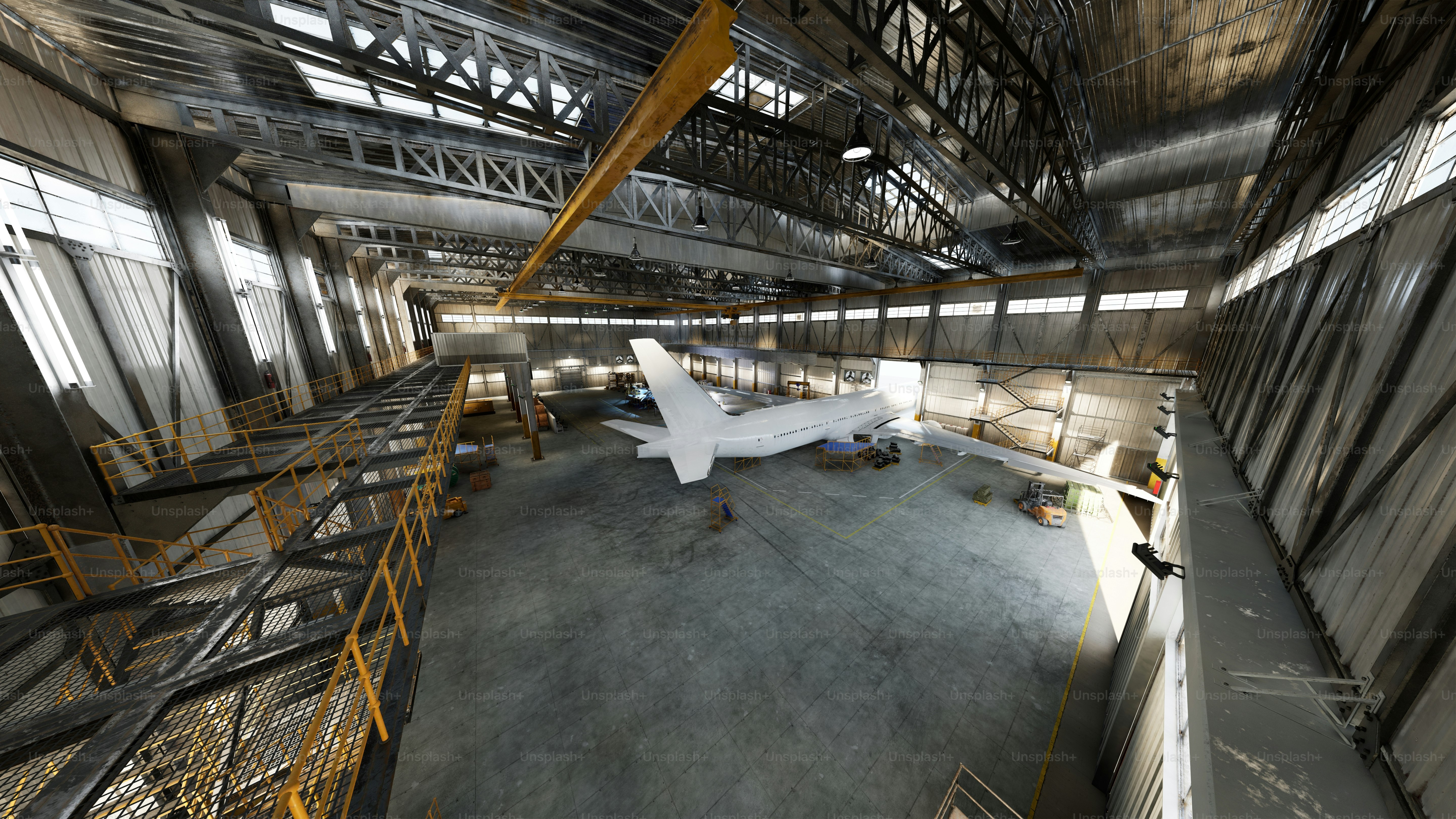 Airplane is inside an old factory hangar.