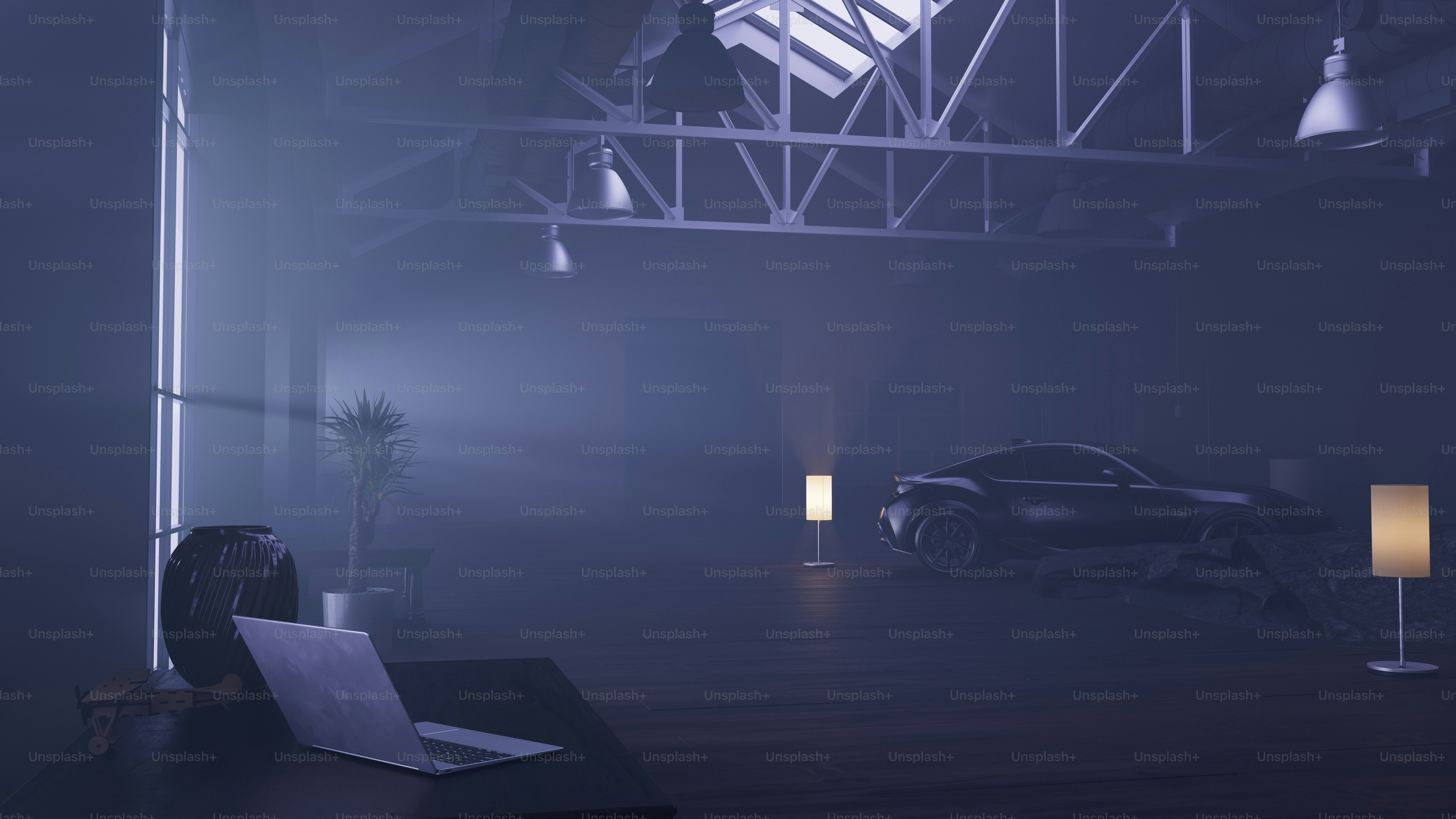 A dark car is parked inside a modern warehouse.