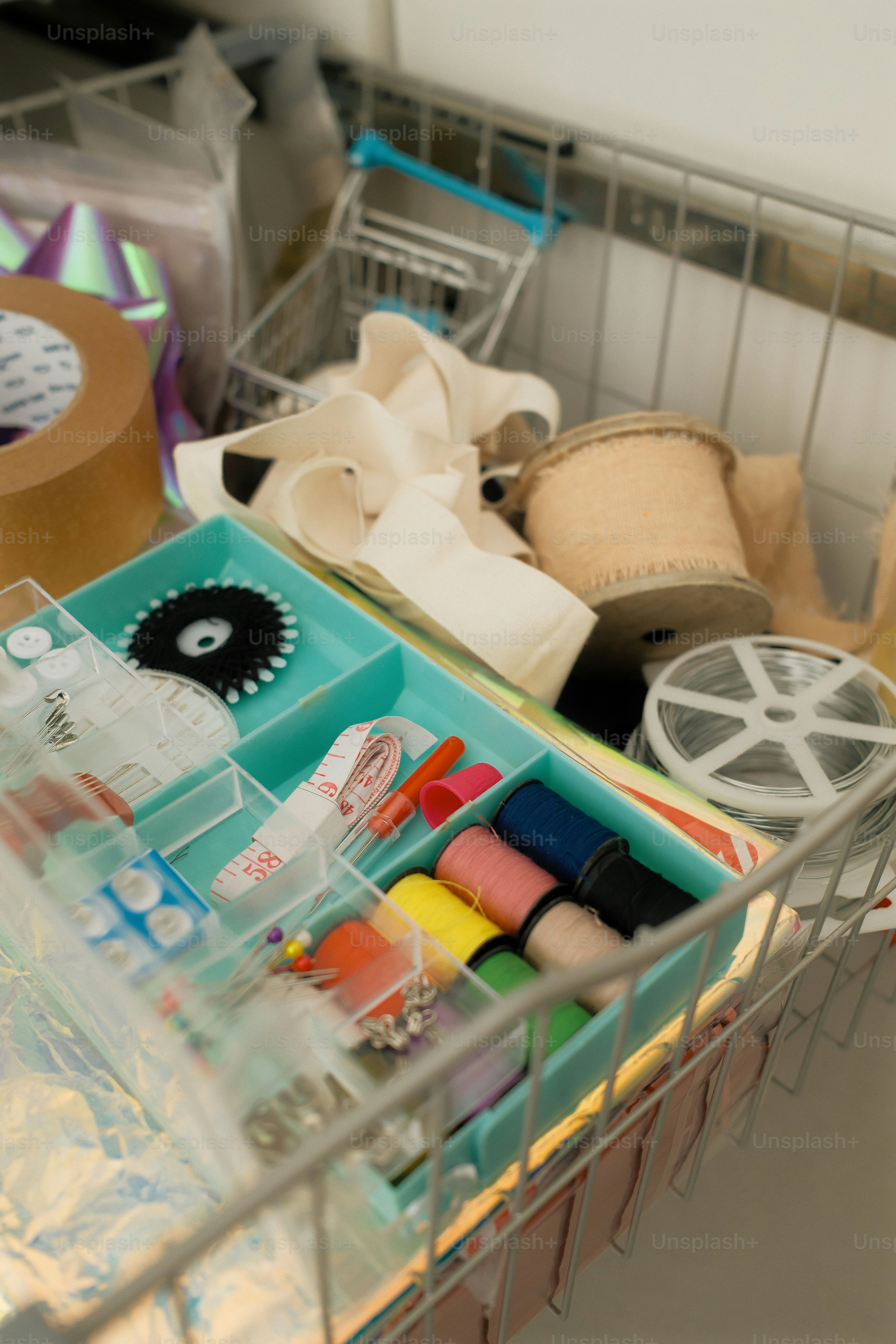 Sewing supplies and various crafting materials.