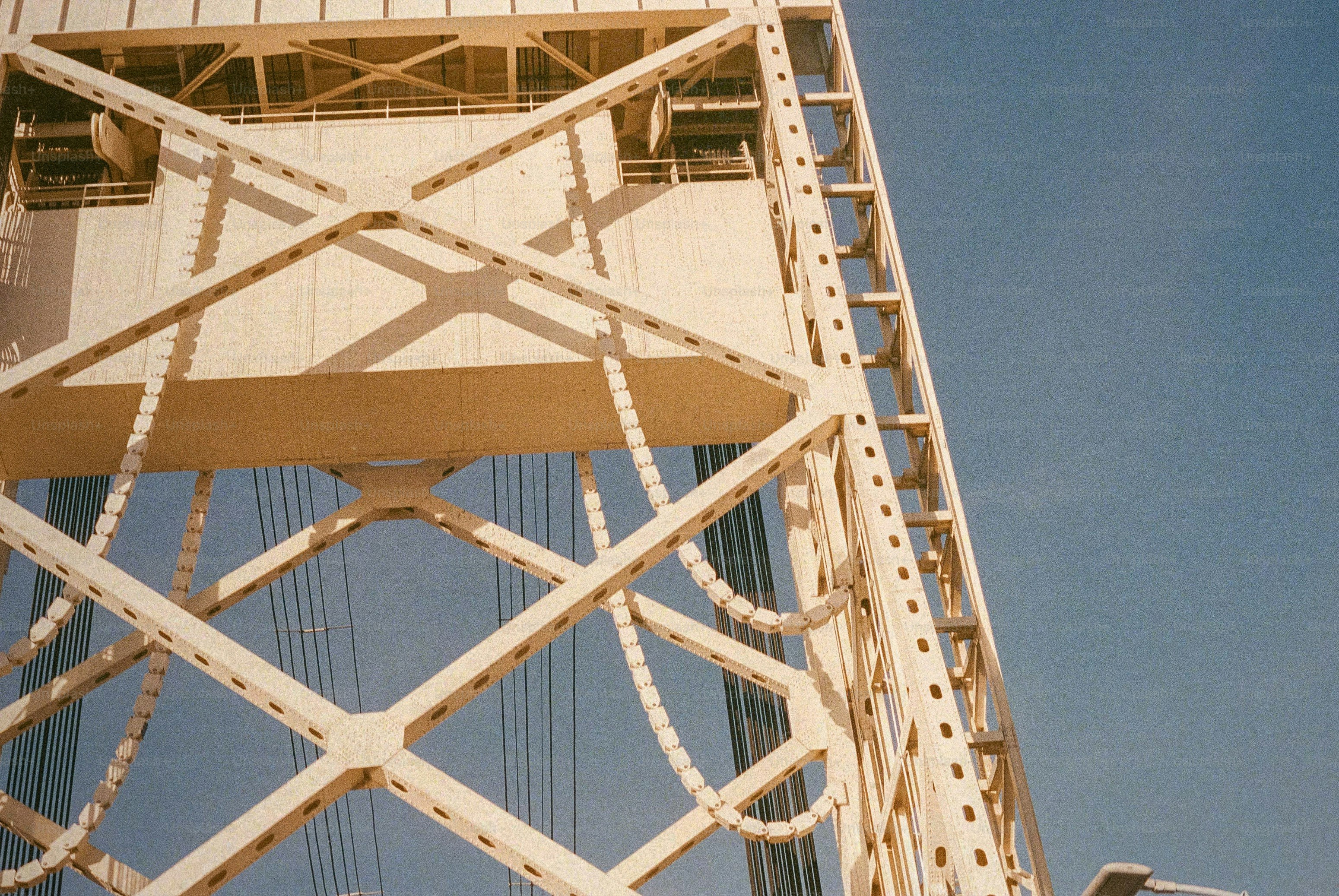 Steel structure of a bridge seen from below.