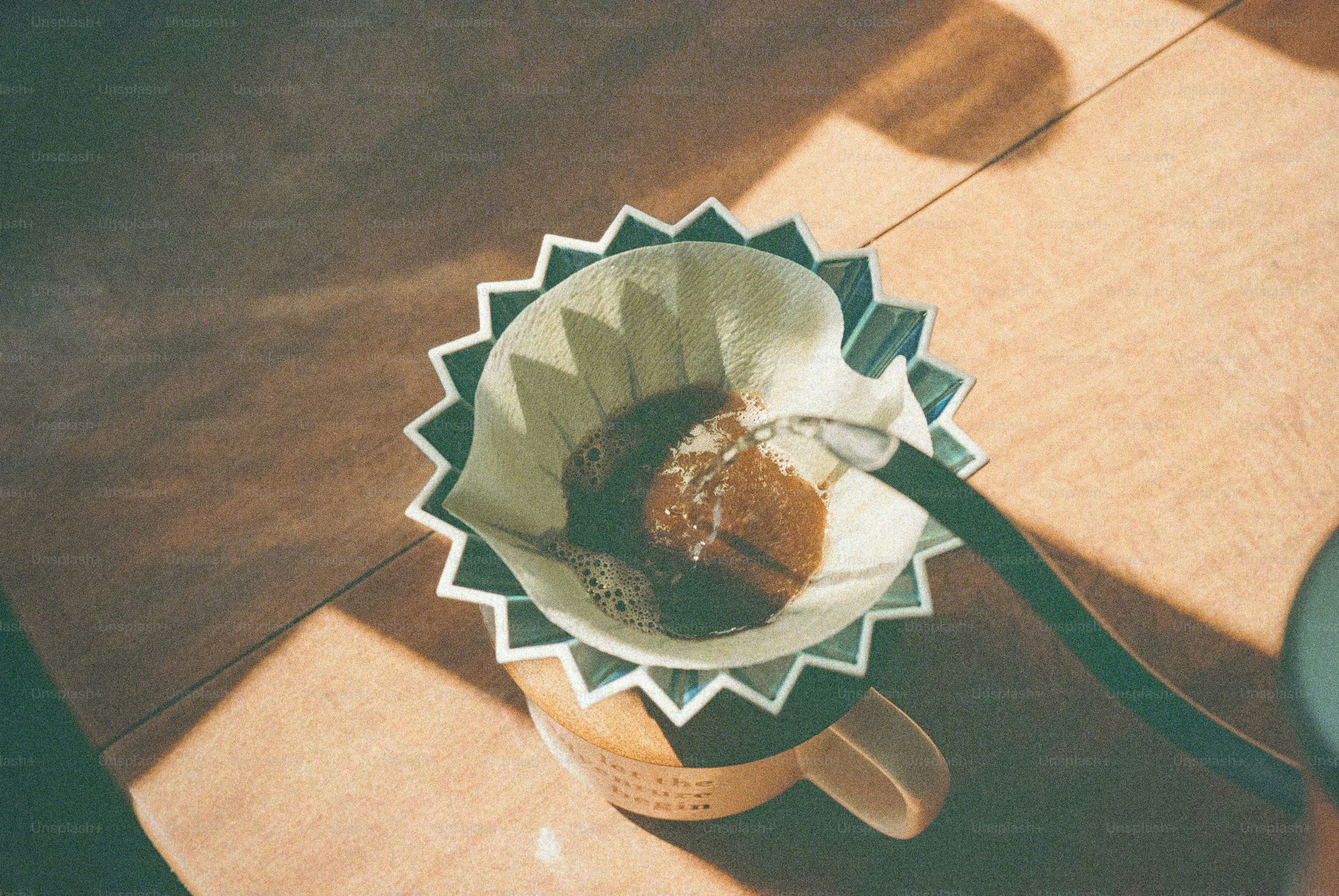 Pouring hot water into a coffee filter.