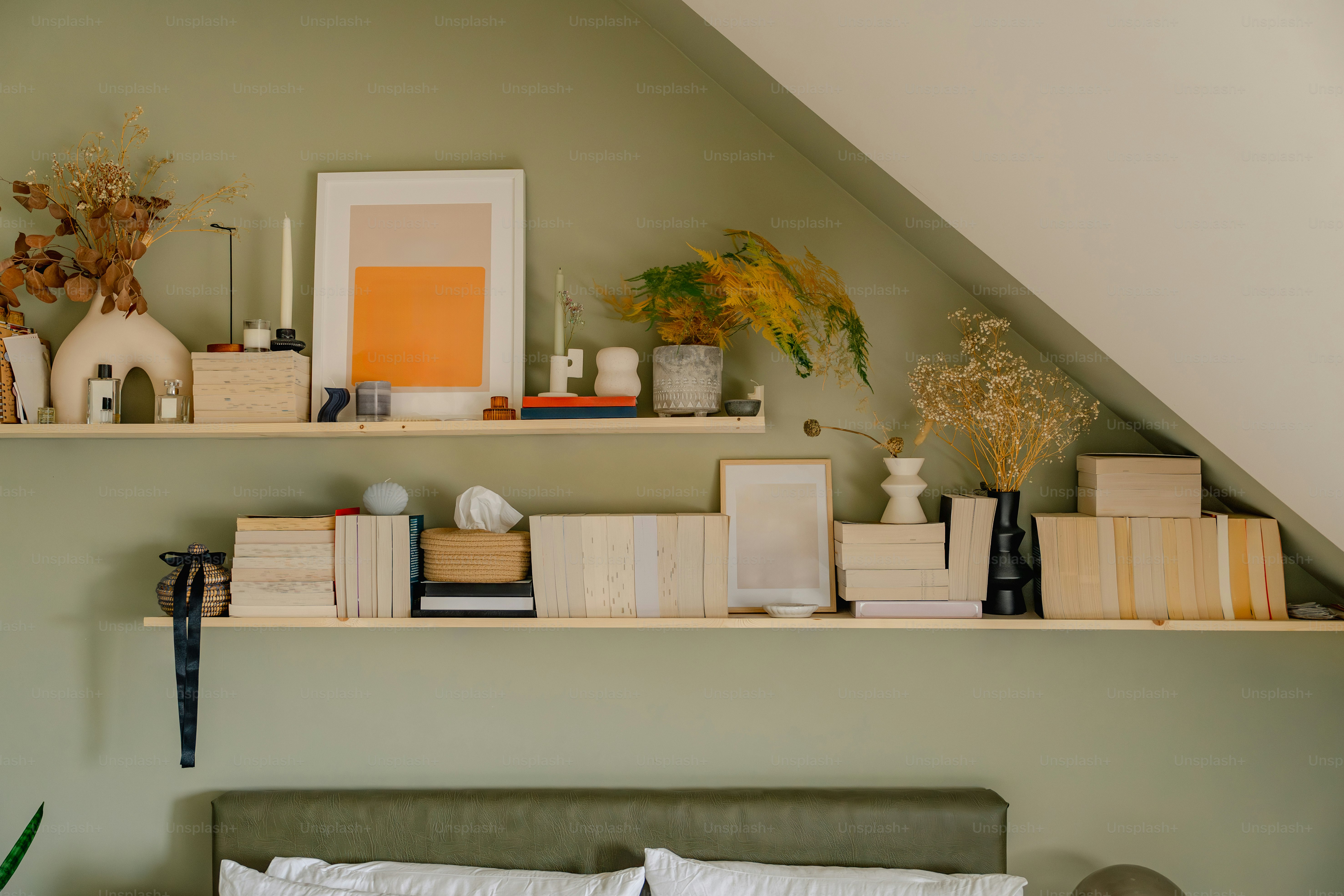 Books and decor beautifully arranged on shelves.