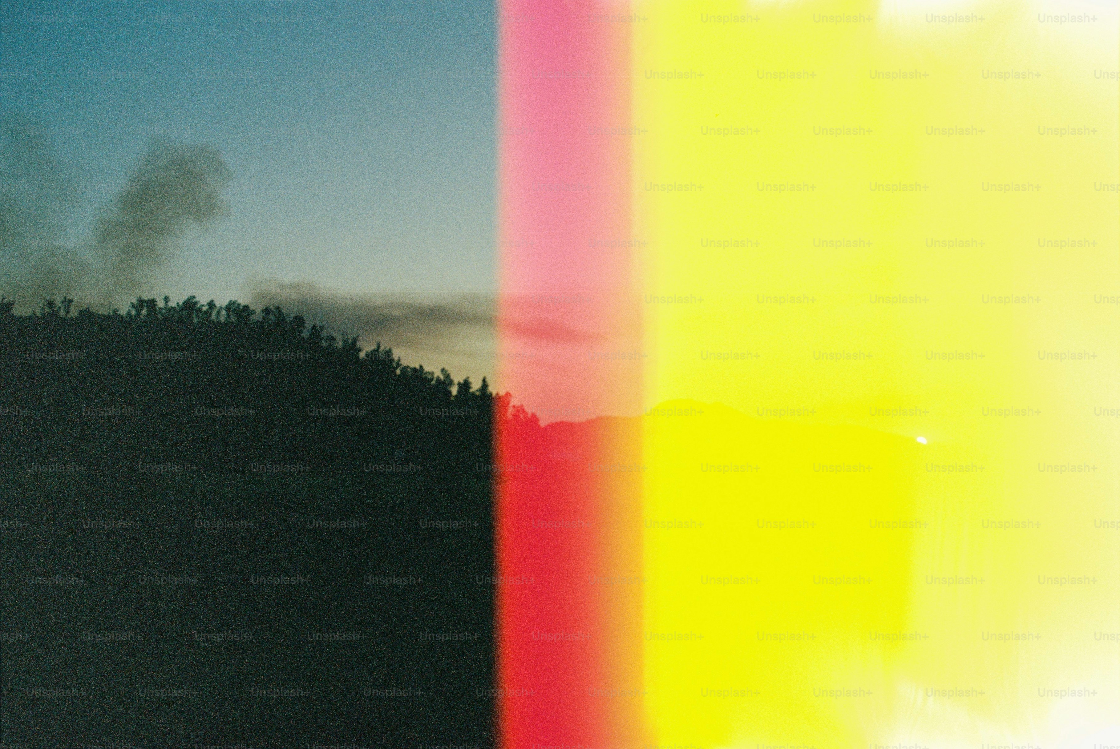 Hills and colors with a film grain effect.