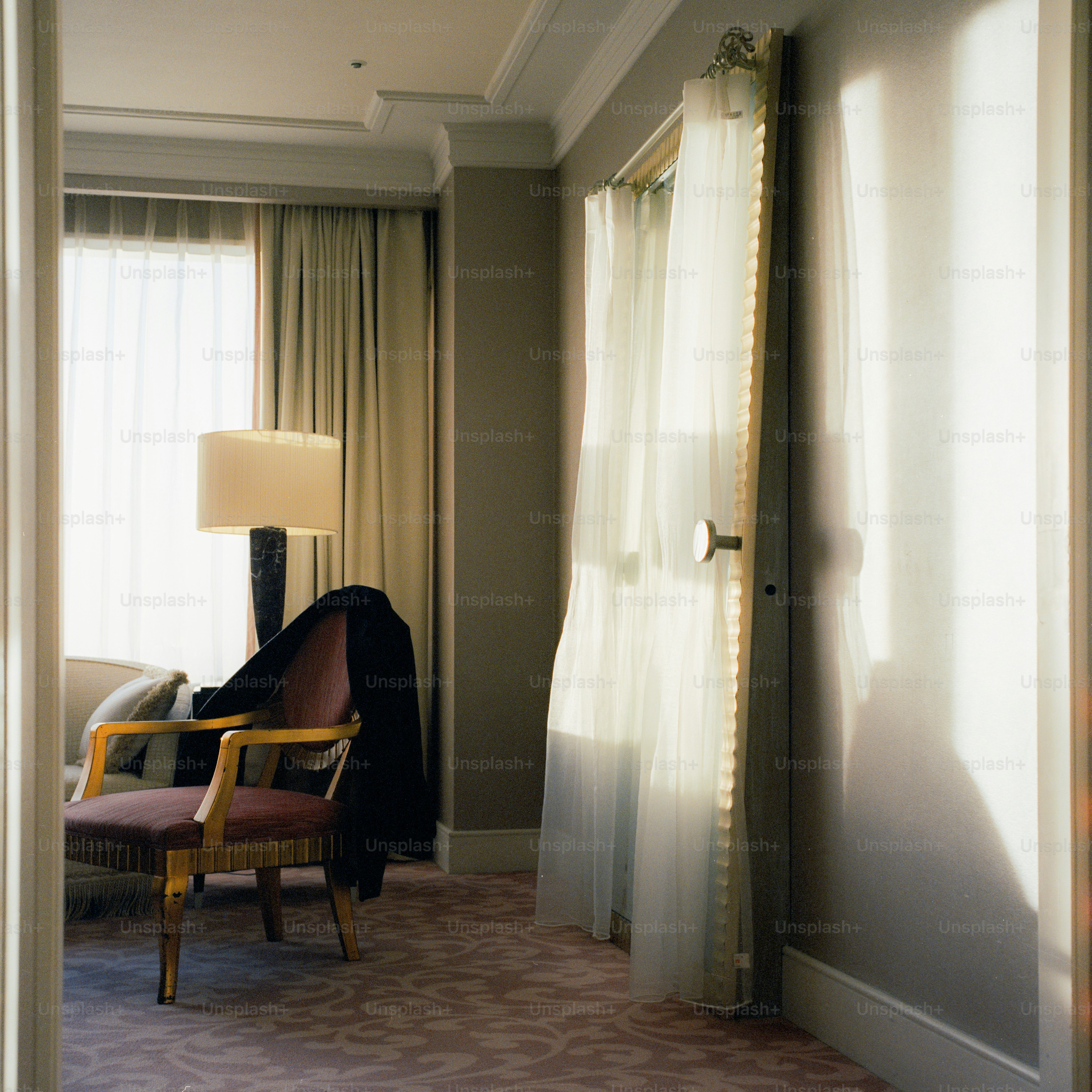 Soft sunlight streams into a well-lit room.