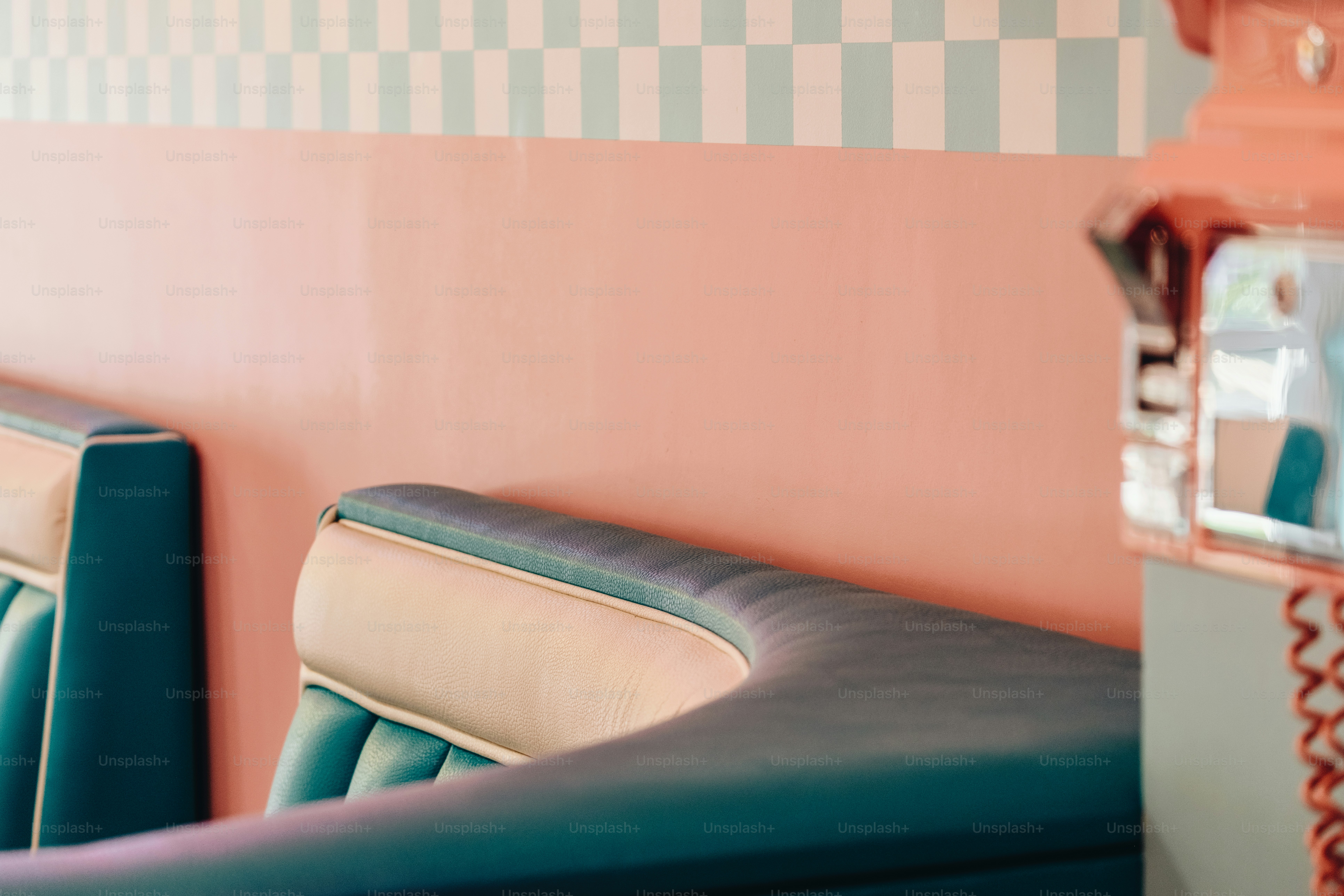 Diner booth with blue and tan seats.
