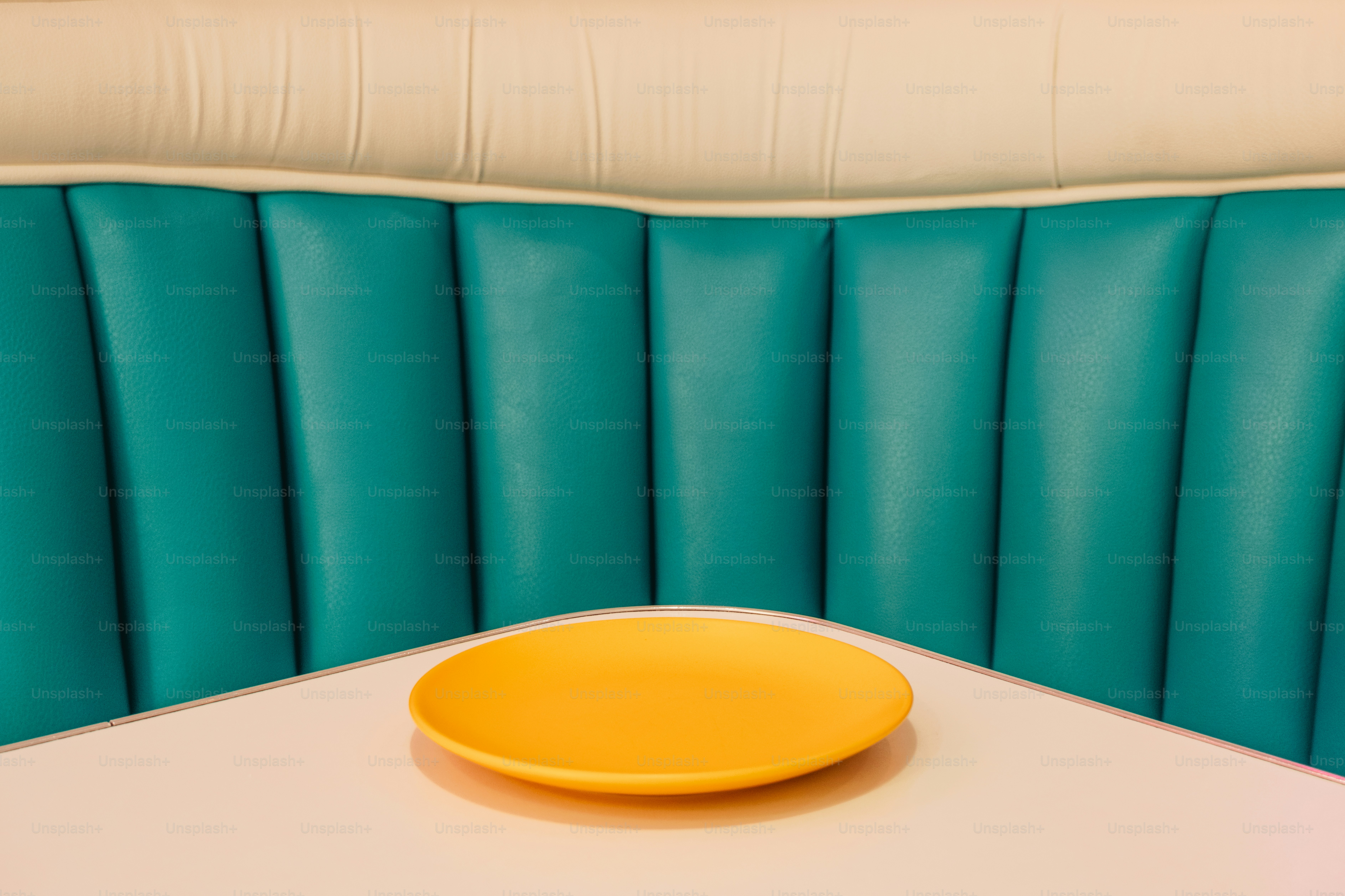 Yellow espresso machine sits on a counter. photo – Interior design ...
