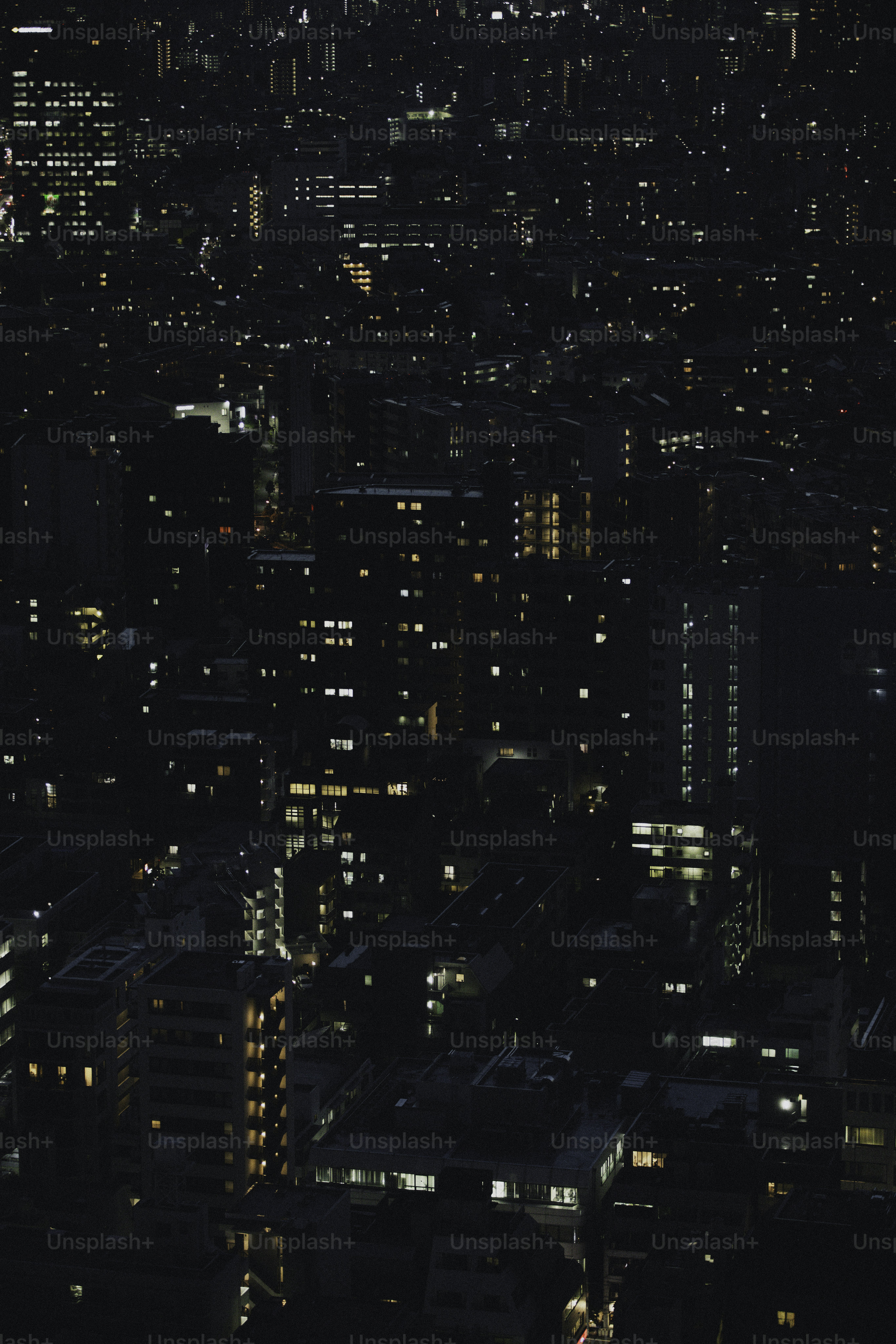 City lights illuminate the night sky.