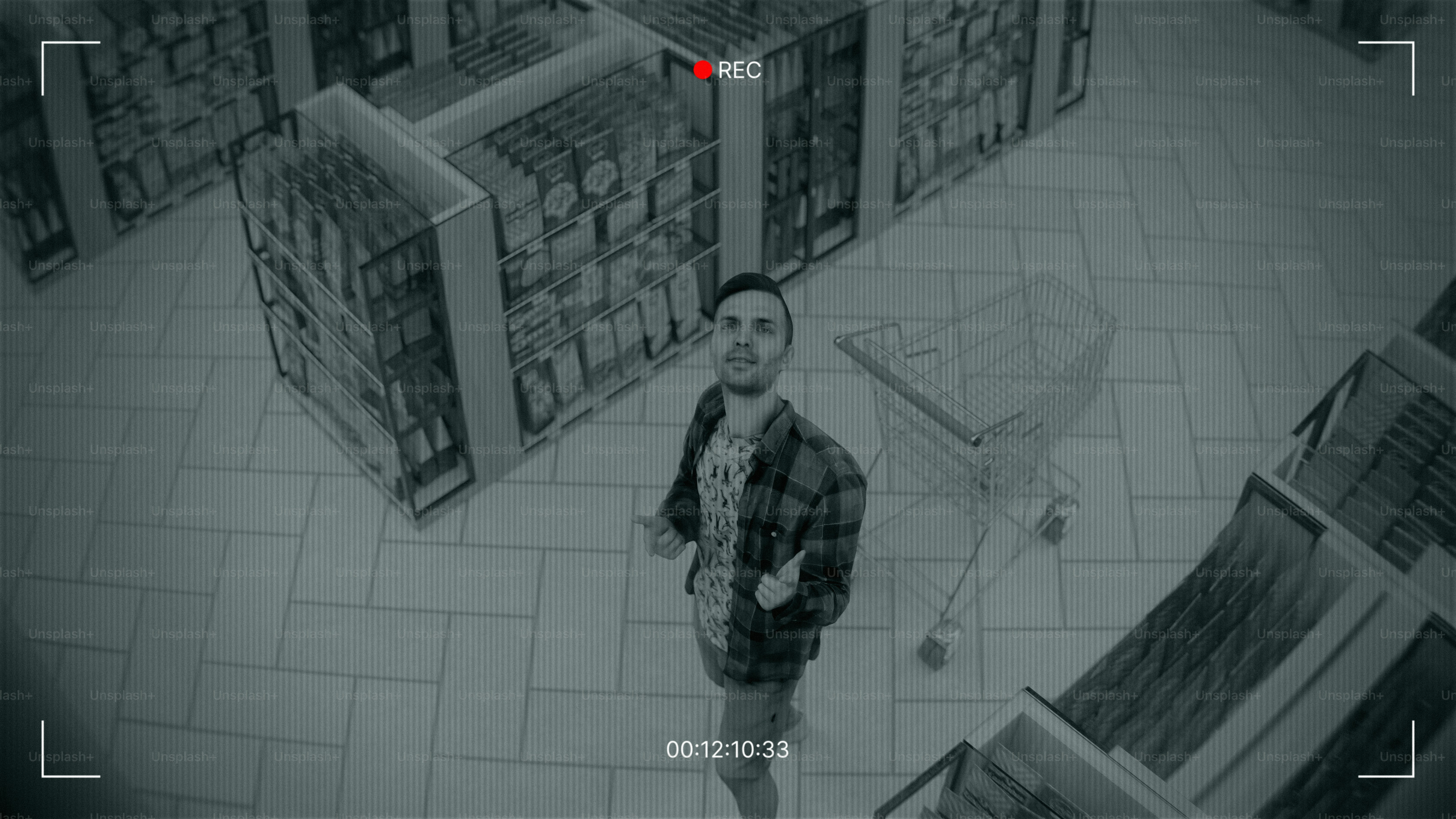 A person is walking through a grocery store.