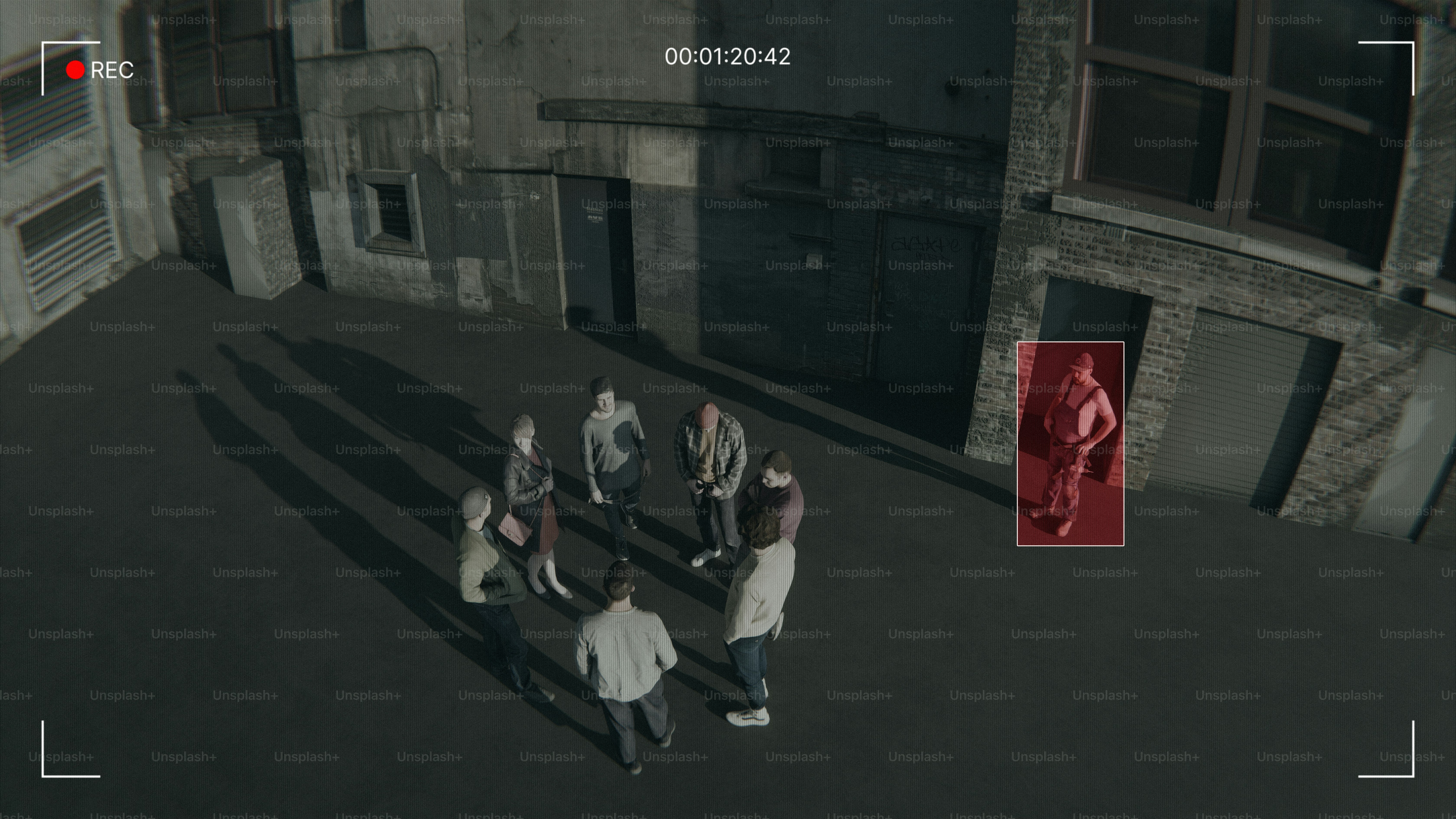 Surveillance footage shows a group of people.