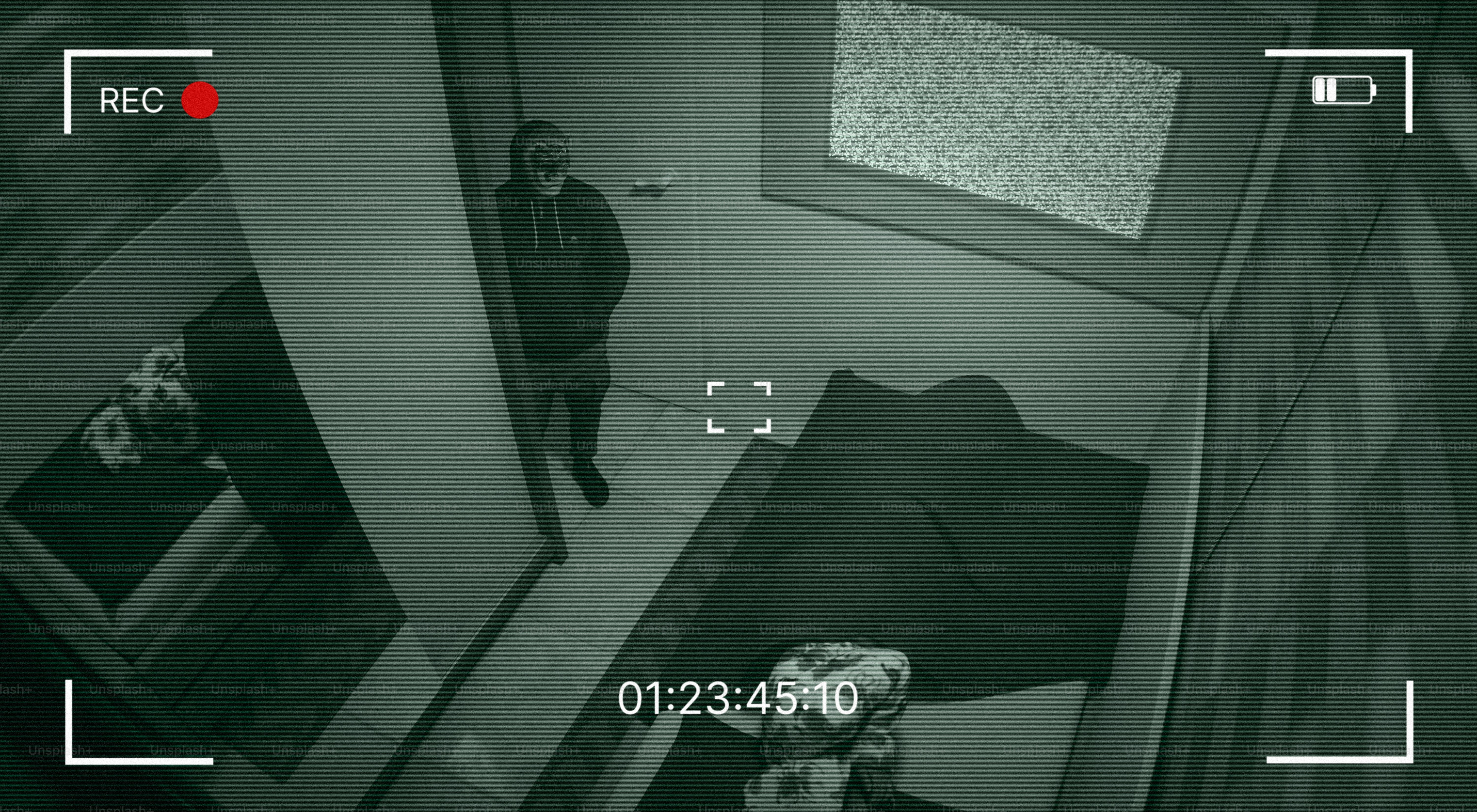 A man appears to be inside a recorded room.